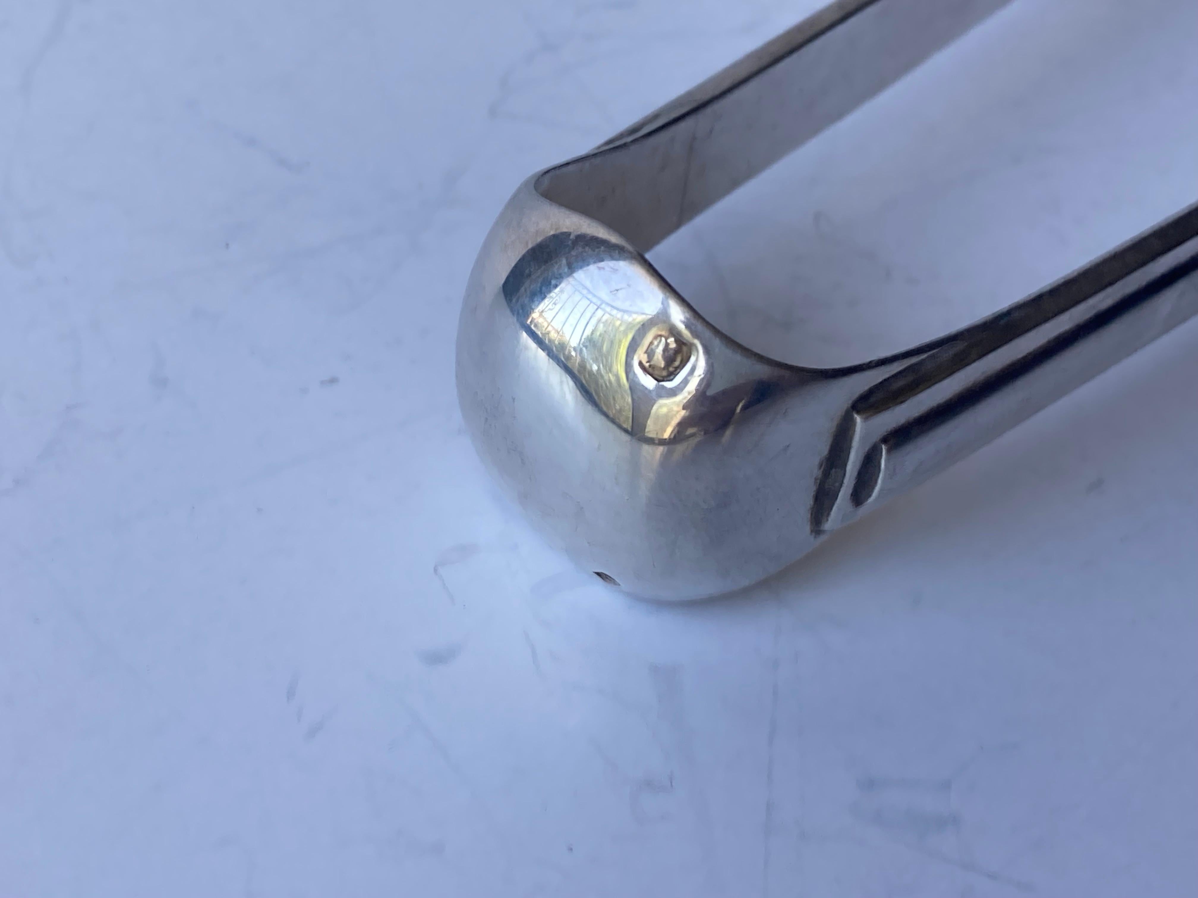 Beautiful fluted lines in this signature piece of the Puiforcat design . Cannes was part of the collection of his wedding in 1928 , was made in sterling silver and marked with the France Minerva Head standard silver .Marked EP and also Puiforcat