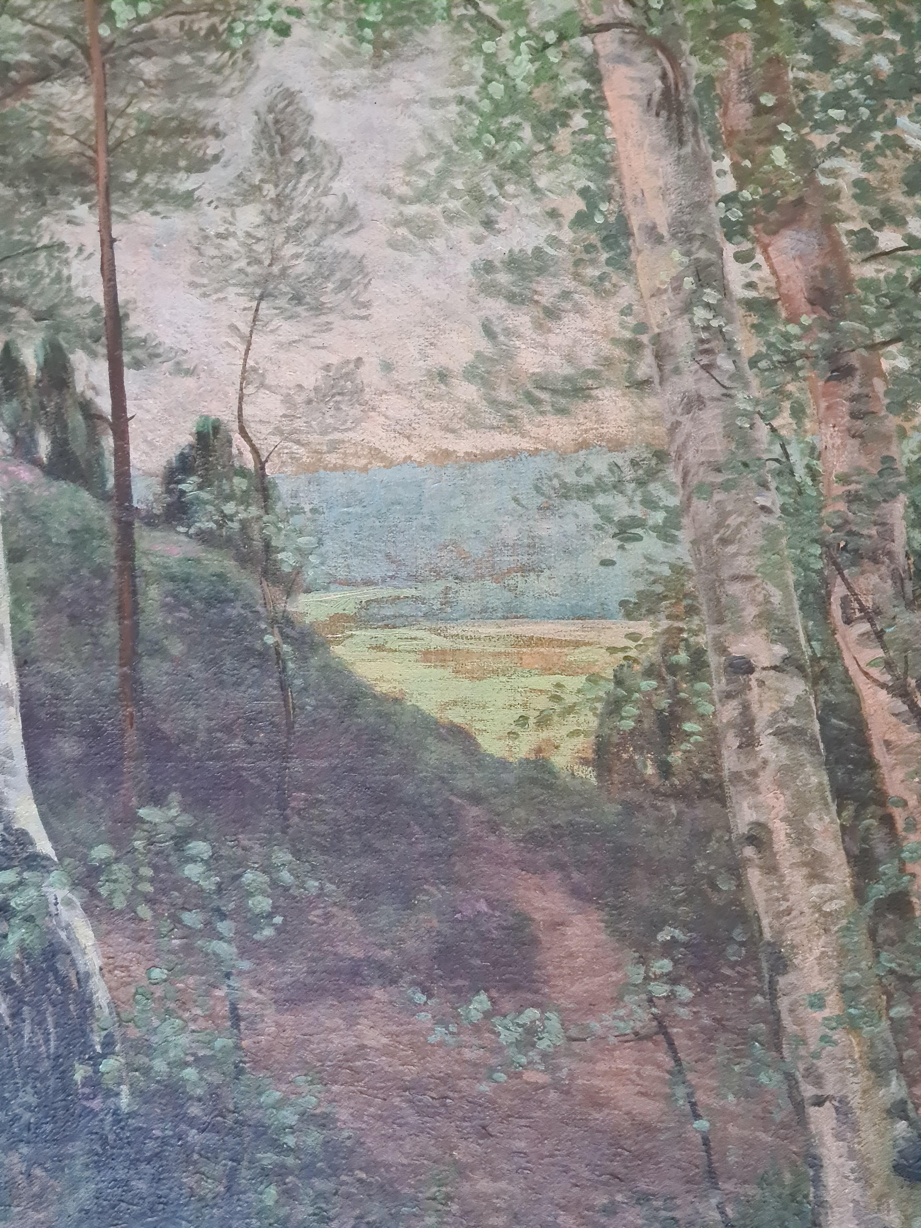 Vue de forêt de l'école de Barbizon, huile sur toile d'Emile Roux-Fabre. Le tableau est signé et daté en bas à gauche avec une dédicace.

Une vue charmante d'une clairière forestière menant à un paysage de vallée au-delà. L'artiste a capturé la