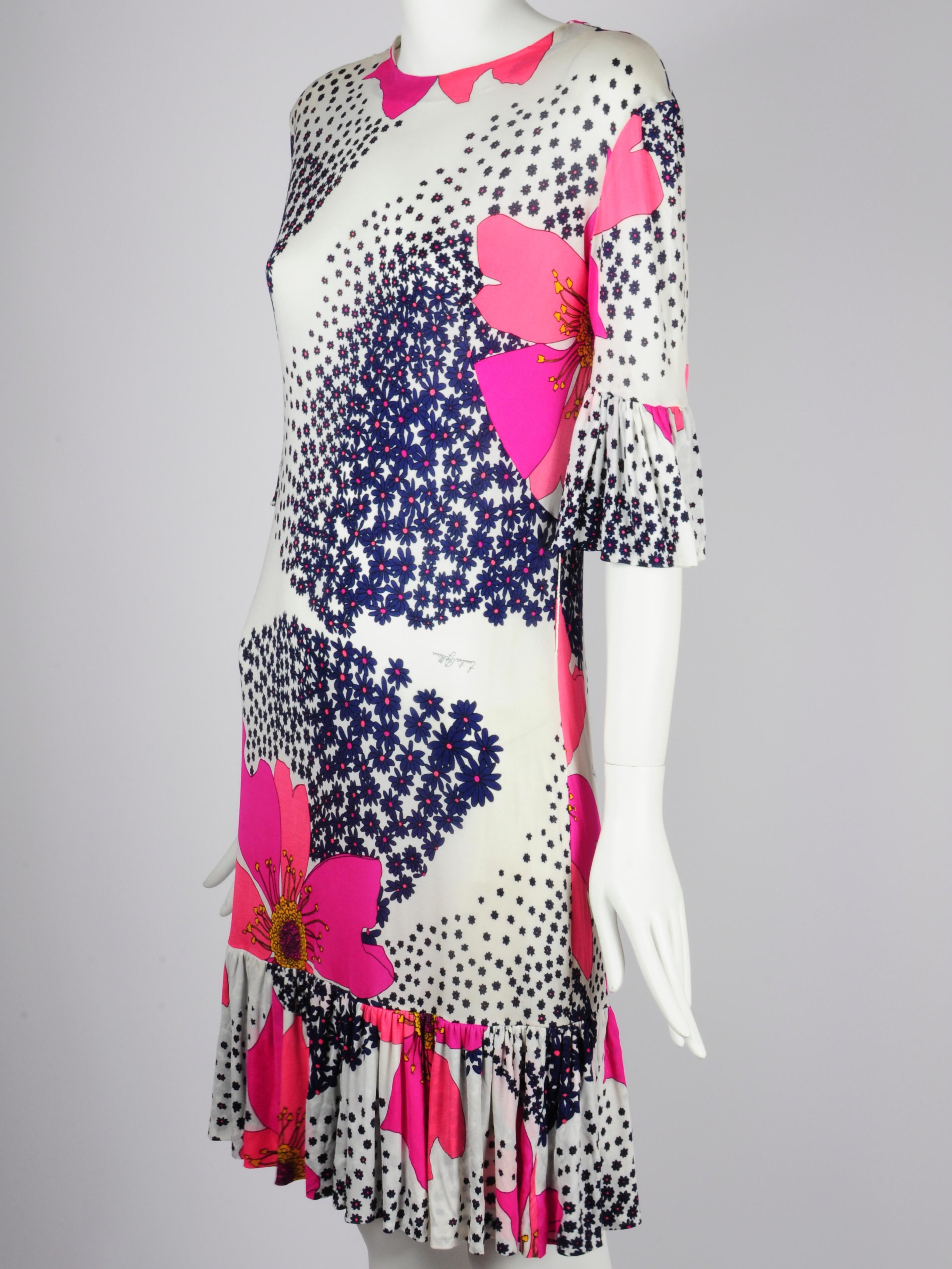 Emilia Bellini Florence silk floral print dress with ruffle detail on the bottom and bell sleeves from the 1960s. Just like Emilio Pucci, Emilia Bellini is known for signing her name inside the prints too. This dress is a little sheer but would work