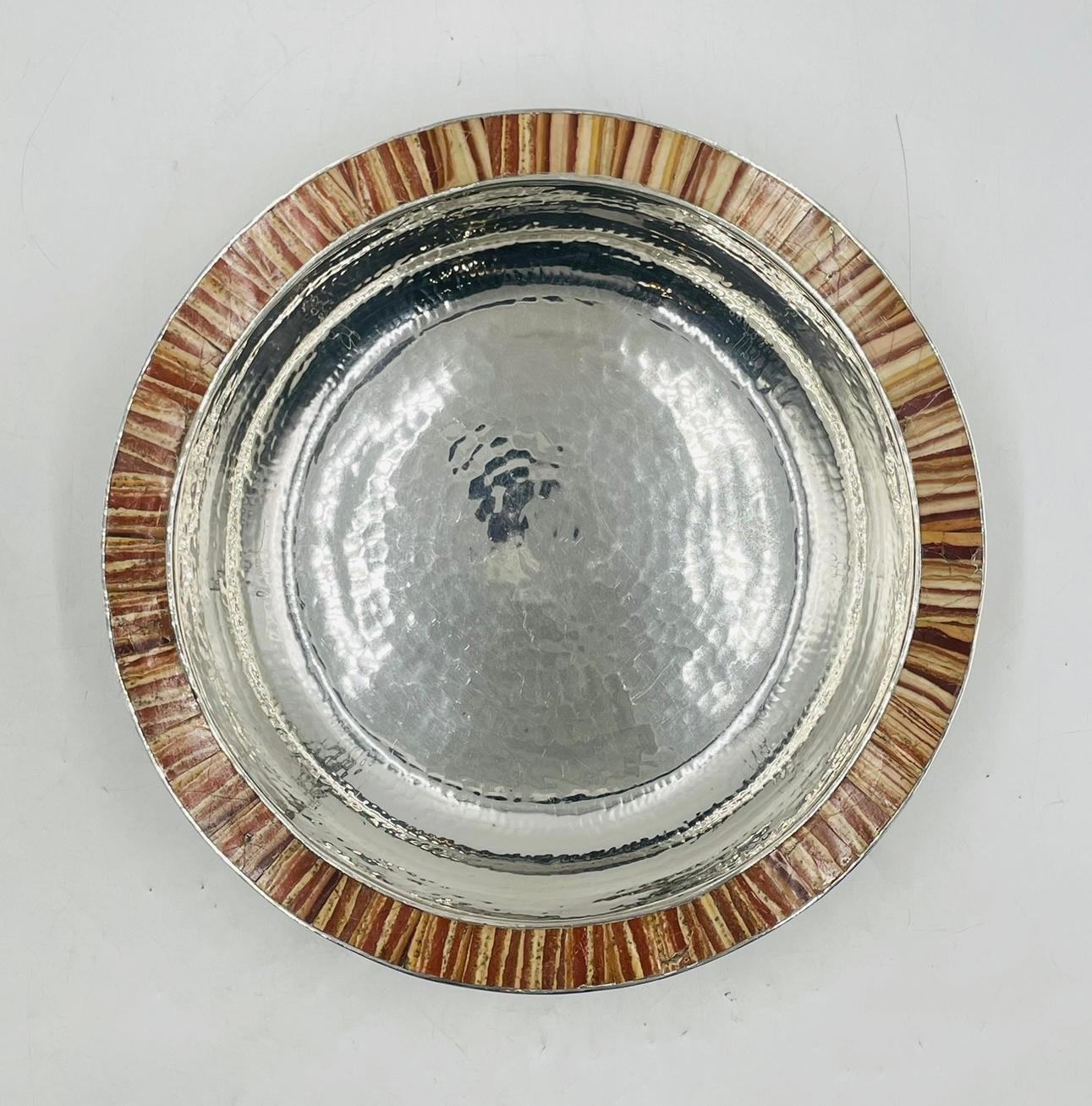This elegant and substantial silverplate bowl by renowned Mexican designer Emilia Castillo showcases her distinctive fusion of metalwork and natural stone. Hand-hammered throughout, the bowl features a wide, slightly flared rim adorned with jasper
