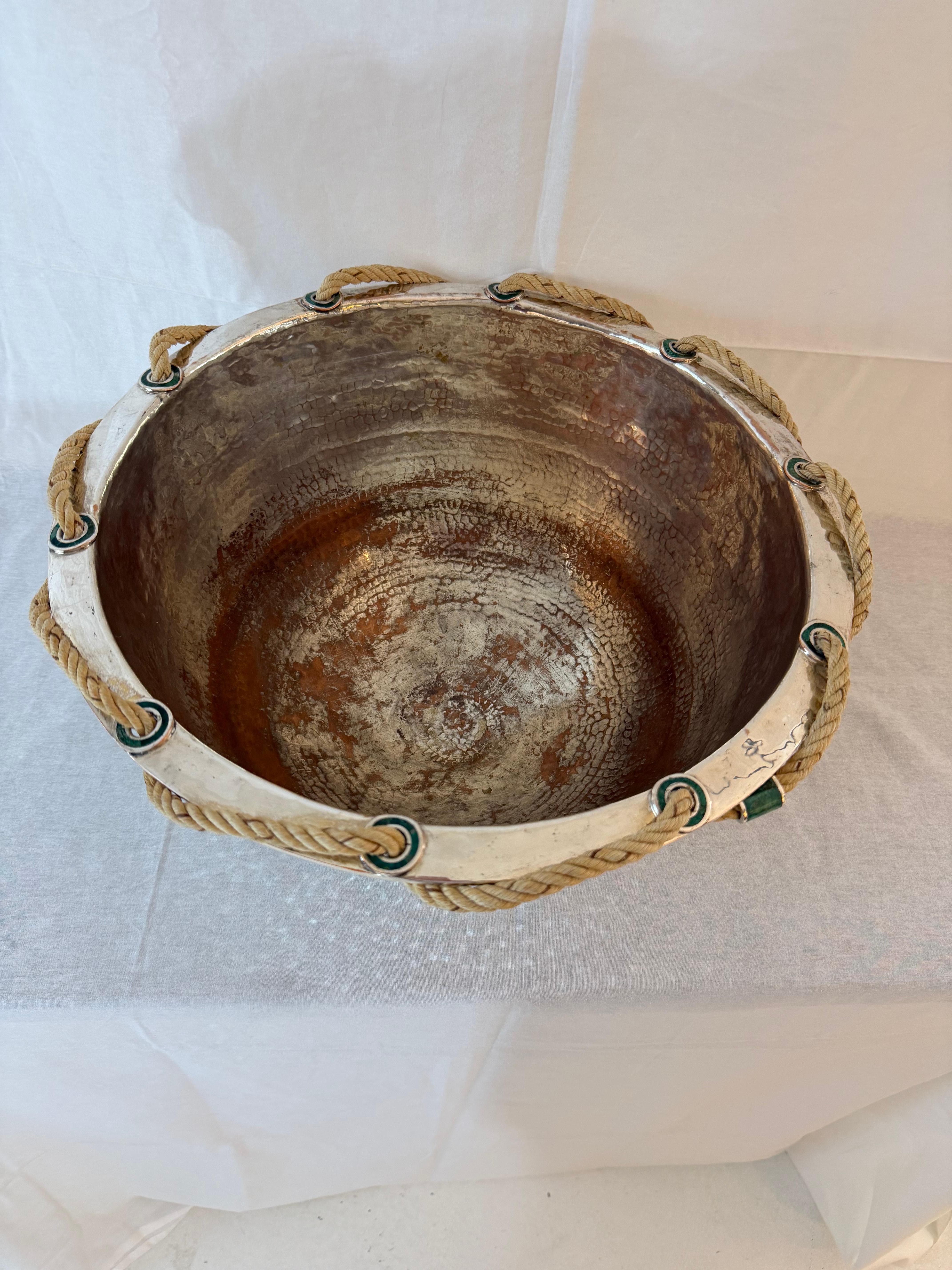 A striking hand-hammered silver-plated copper bowl by Emilia Castillo, featuring the artist’s signature fusion of natural materials and refined craftsmanship. The gleaming, textural surface showcases Castillo’s renowned silversmithing artistry,