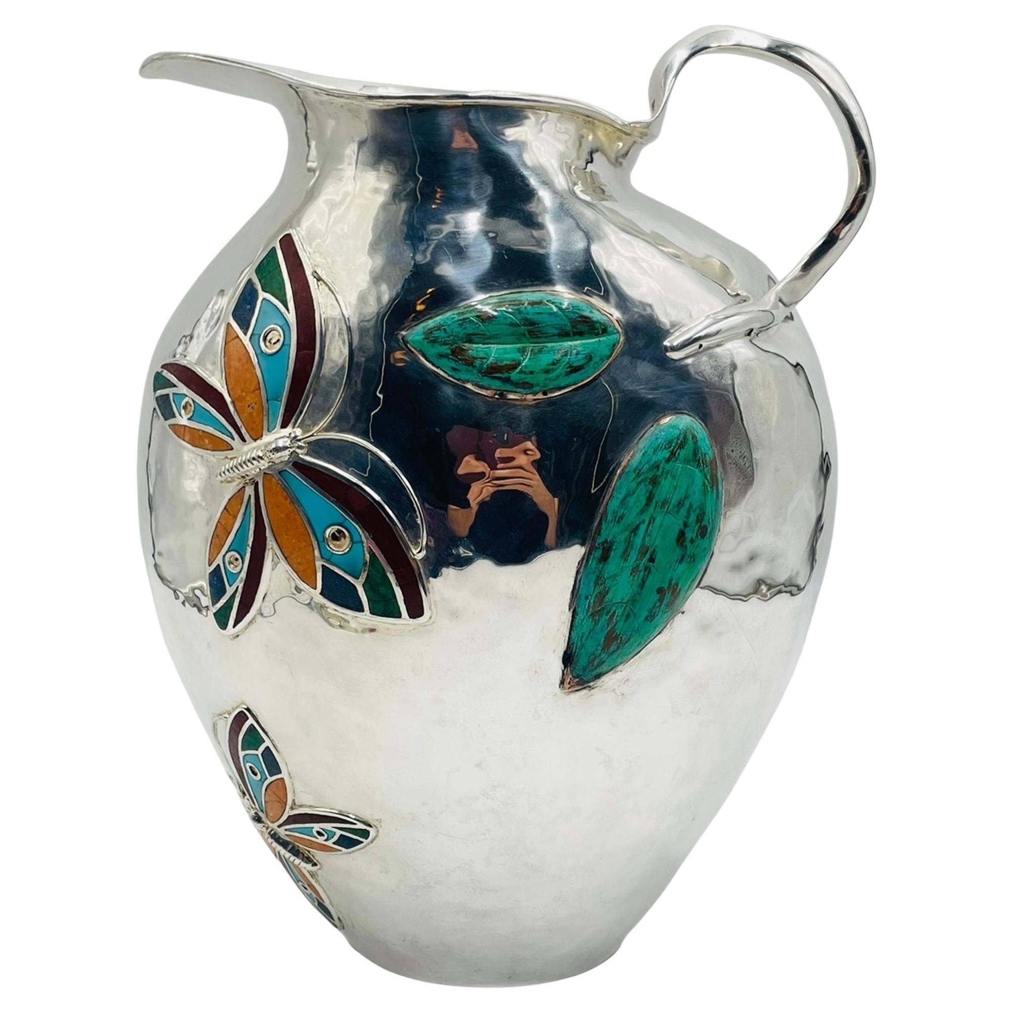 Brocca d
argento sovradimensionata di Emilia Castillo con intarsio di pietre, argenteria Taxco