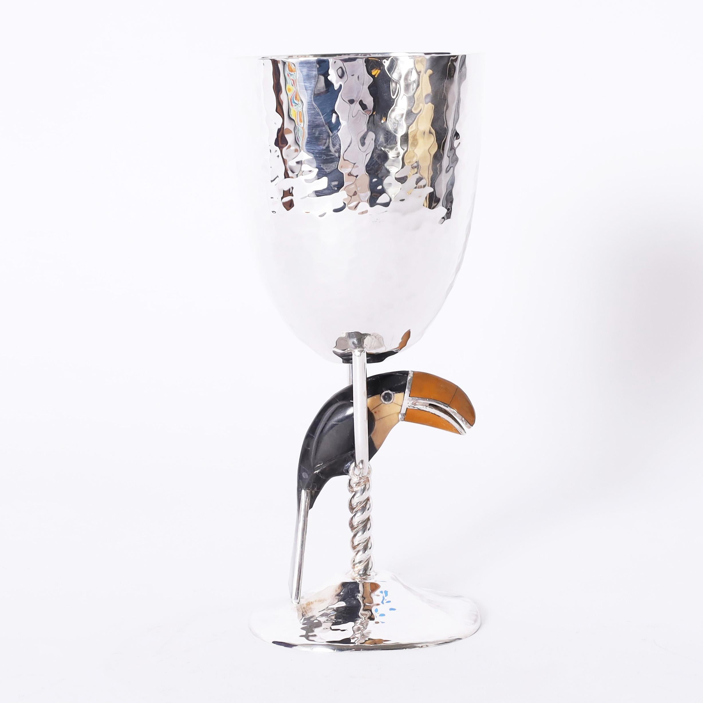 Standout set of eight vintage goblets or wine glasses handcrafted in silver plate over hammered copper in classic form and featuring stone clad toucans perched over the twisted stems. Signed Emilia Castillo on the bottoms.