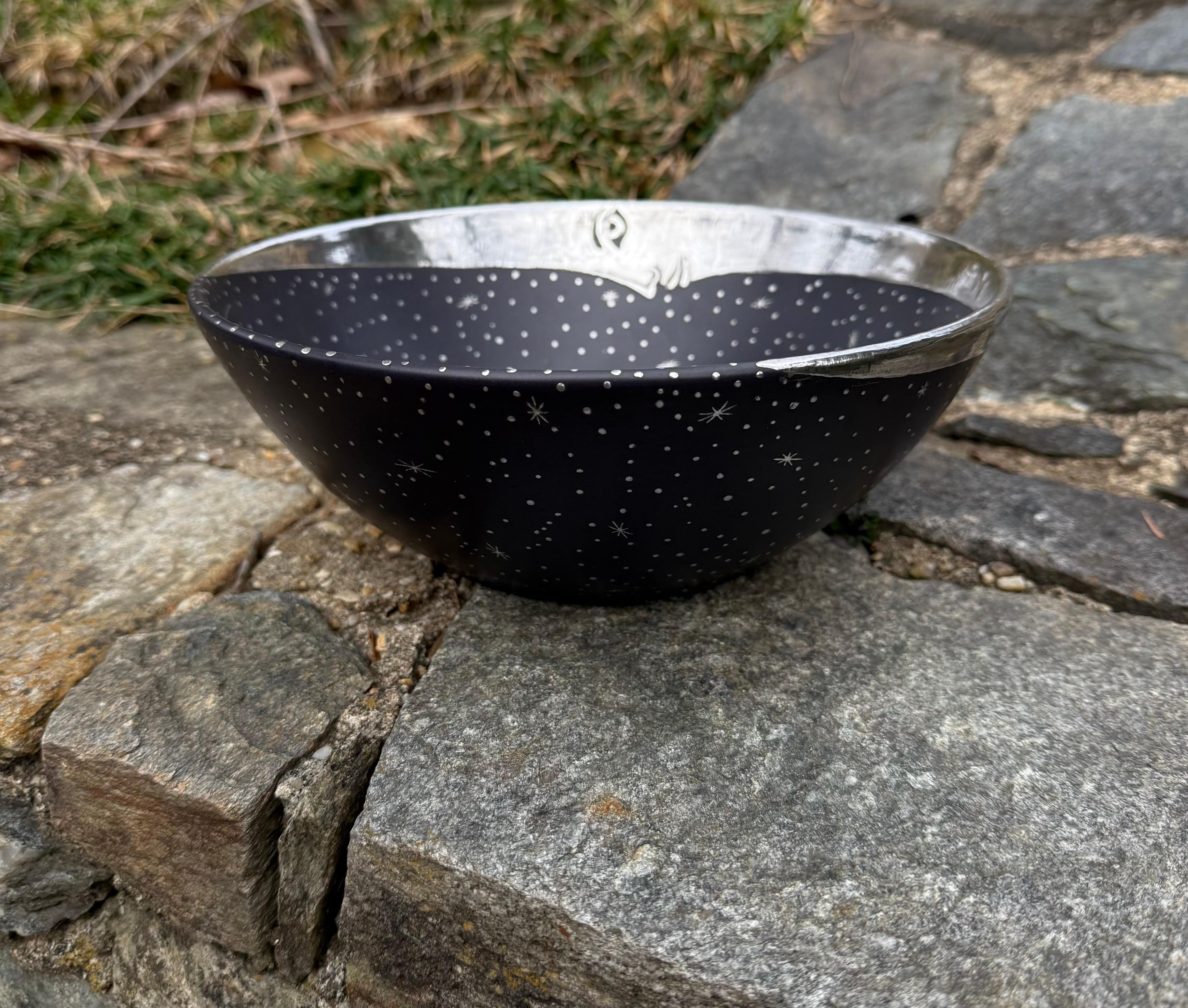 Emilia Castillo 'Northern Star' Bowl Matte Black Glazed Porcelain with Sterling Silver Overlay.
Large Crescent Moon On One Edge, Large Star On The Other.
Absolutely Adorned with Sterling Stars and Specks, Inside and Out.