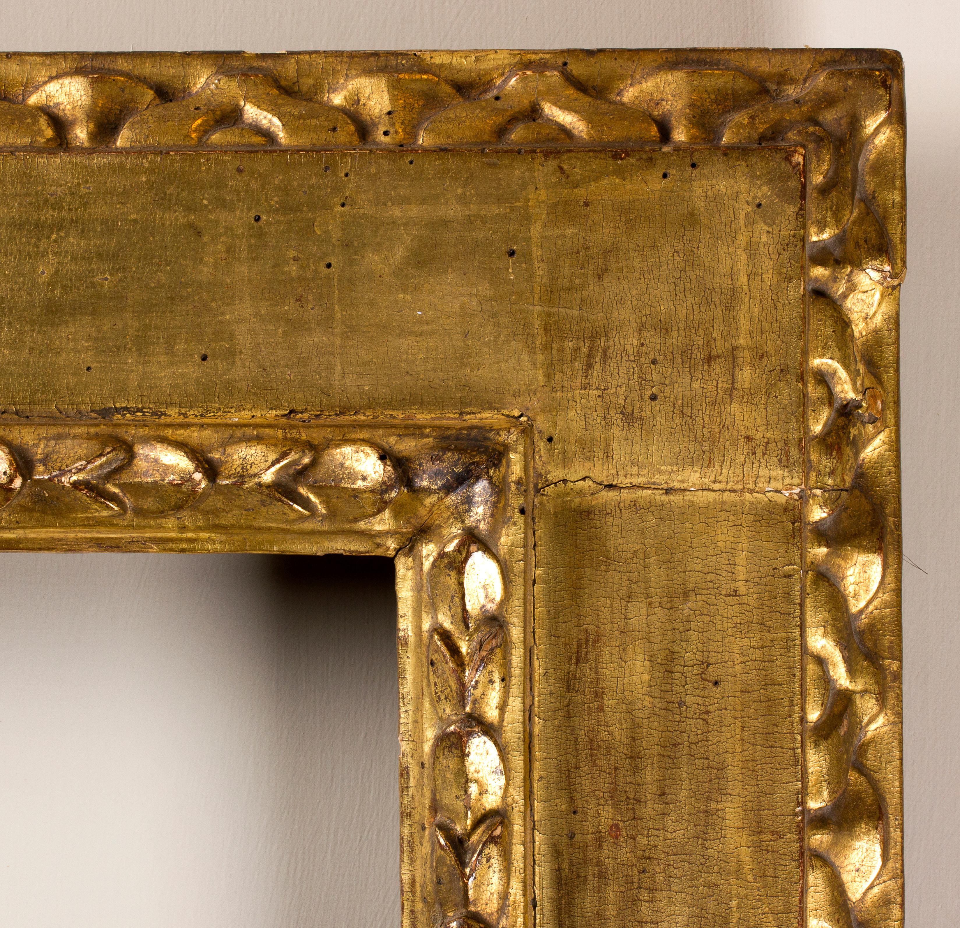 Emilia frame, end of 16th century
Golden cassetta frame carved with recurring leaves motif and with leaf and leaflet pattern.
Luce: 34.2 x 44.5 cm; ingombro: 57.2 x 67.5 cm.
Depth is the wide of the band.
 
