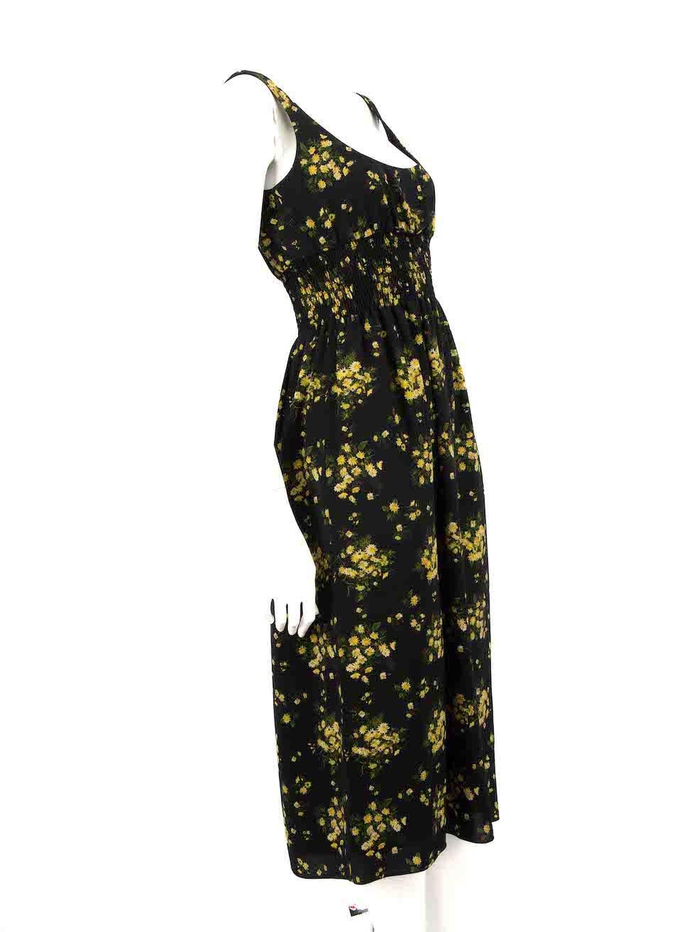 CONDITION is Very good. Hardly any visible wear to dress is evident on this used Emilia Wickstead designer resale item.
 
 
 
 Details
 
 
 Black
 
 Polyester
 
 Dress
 
 Yellow floral print
 
 Sleeveless
 
 Elasticated waist
 
 Round neck
 
 Midi
