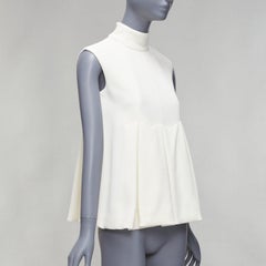 EMILIA WICKSTEAD cream crepe pleated front panel hi neck peplum top UK6 XS