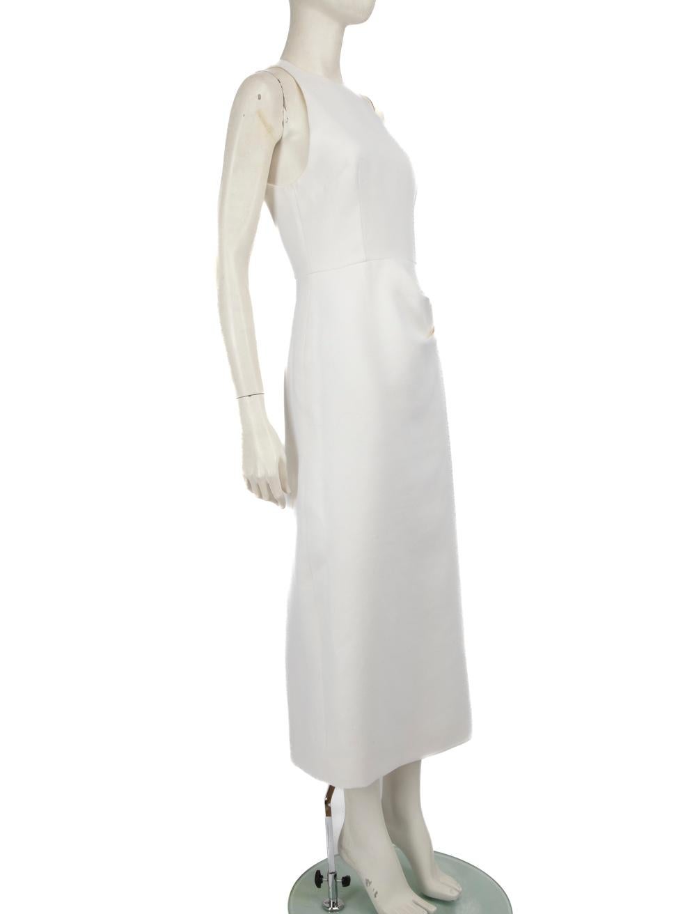 CONDITION is Never worn, with tags. Due to poor storage of the dress, there is one mark on the back left of this new Emilia Wickstead designer resale item.



Details


Ivory

Wool

Dress

Midi

Sleeveless

High round neck

Back zip fastening

Side