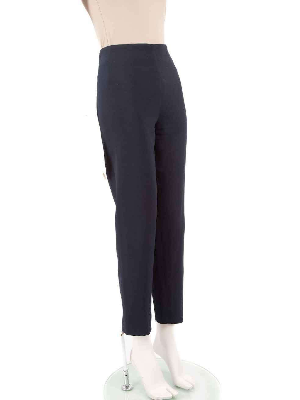 CONDITION is Very good. Minimal wear to the trousers is evident. There is a mark on the lining of the leg cuffs and the brand label is loose on this used Emilia Wickstead designer resale item.
 
 Details
 Navy
 Polyester
 Trousers
 Slim leg
 High