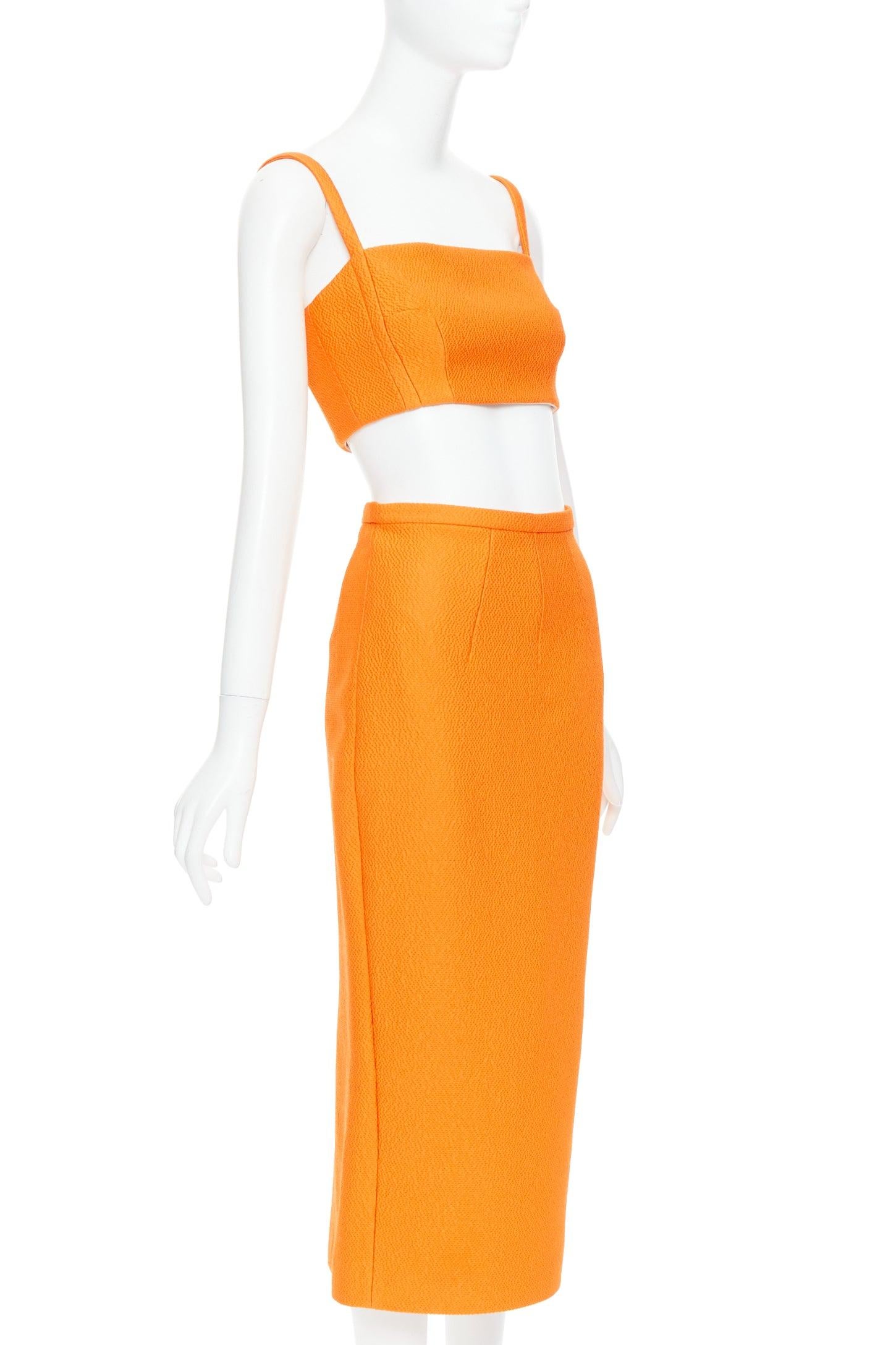 EMILIA WICKSTEAD orange darted panelled crop top pencil skirt set UK8 S
Reference: LNKO/A02553
Brand: Emilia Wickstead
Material: Polyester, Blend
Color: Orange
Pattern: Solid
Closure: Zip
Lining: Nude Fabric
Made in: Portugal

CONDITION:
Condition: