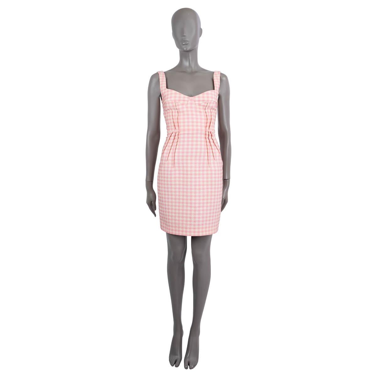 100% authentic Emilia Wickstead fitted seersucker gingham short dress in pink and off-white polyester (75%), polyamide (15%), silk (8%) and elastane (2%). Opens with a zipper on the back. Upper part is lined in white polyester (100%). Has been worn