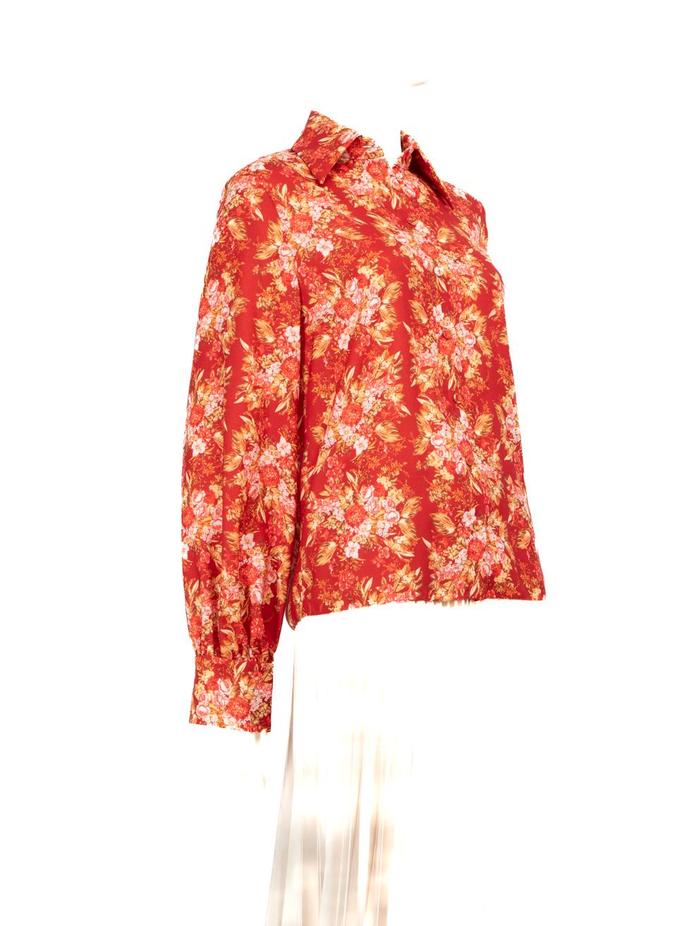 CONDITION is Very good. Hardly any visible wear to shirt is evident on this used Emilia Wickstead designer resale item.
 
 
 
 Details
 
 
 Red
 
 Wool
 
 Shirt
 
 Floral print
 
 Long sleeves
 
 Buttoned cuffs
 
 Button up fastening
 
 
 
 
 
 Made