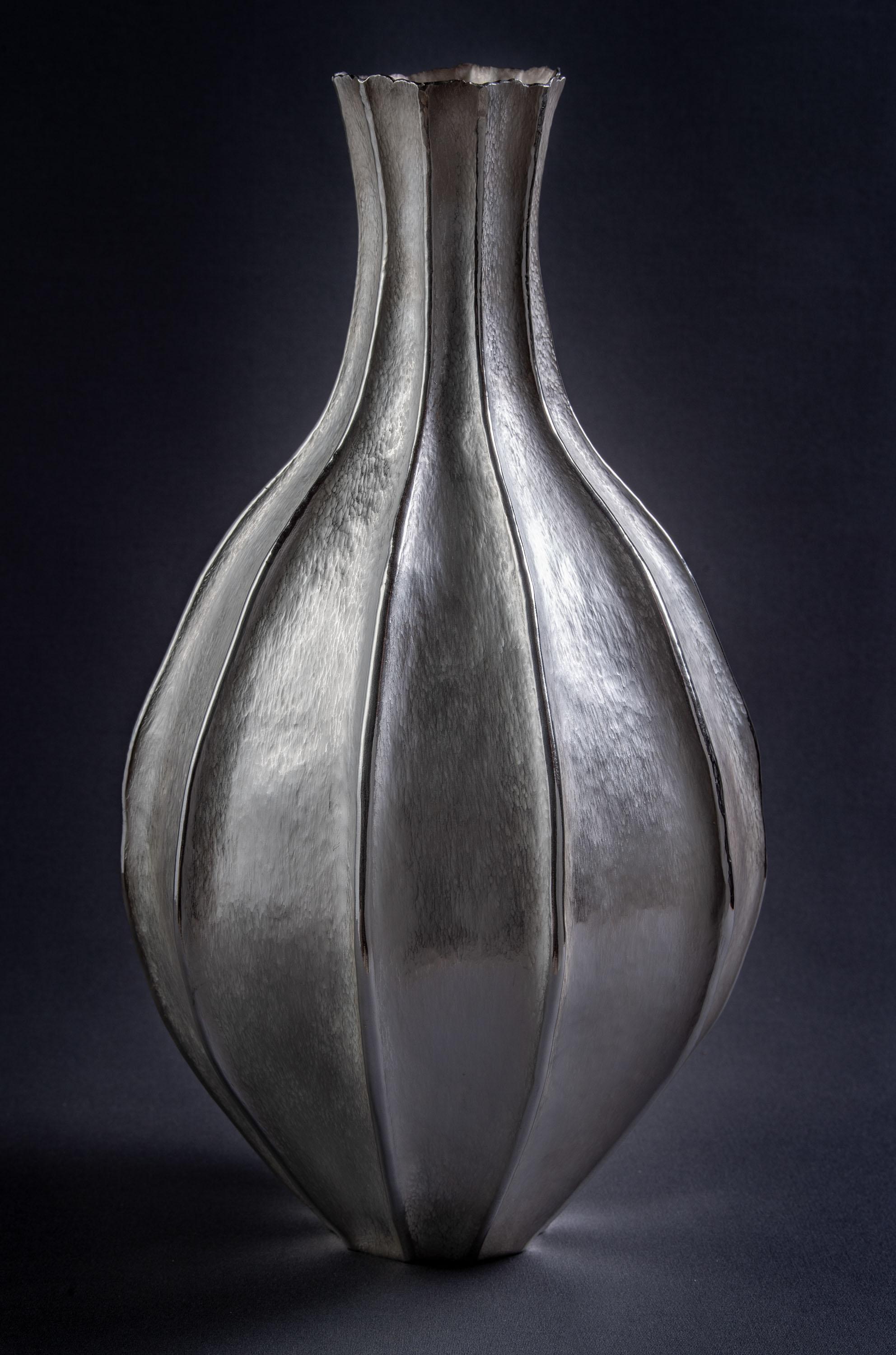 Out of Time II is a powerful piece that plays with the concepts of the master Tapio Wirkkala, specifically the broken rhythm of nature's design. 

Unique piece.
Stamped.

Residing in the San Martin de los Andes of Patagonia, Celiz takes as his