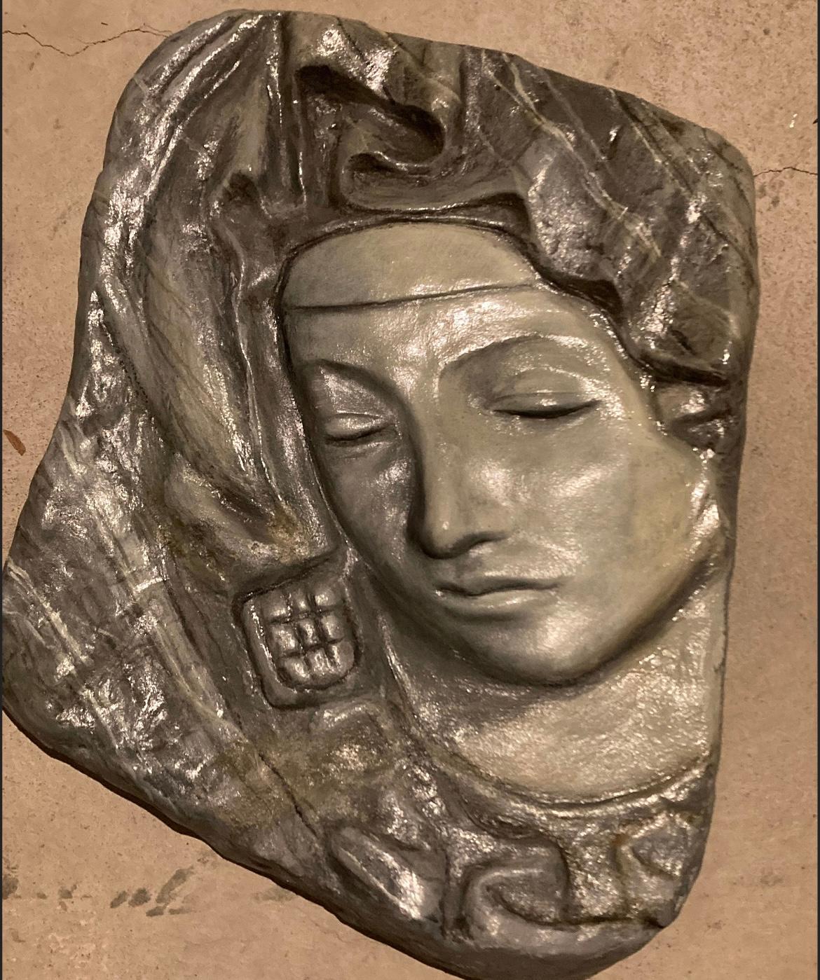 this is an original sculpture signed in the back multiple times . in good condition measures 12x10