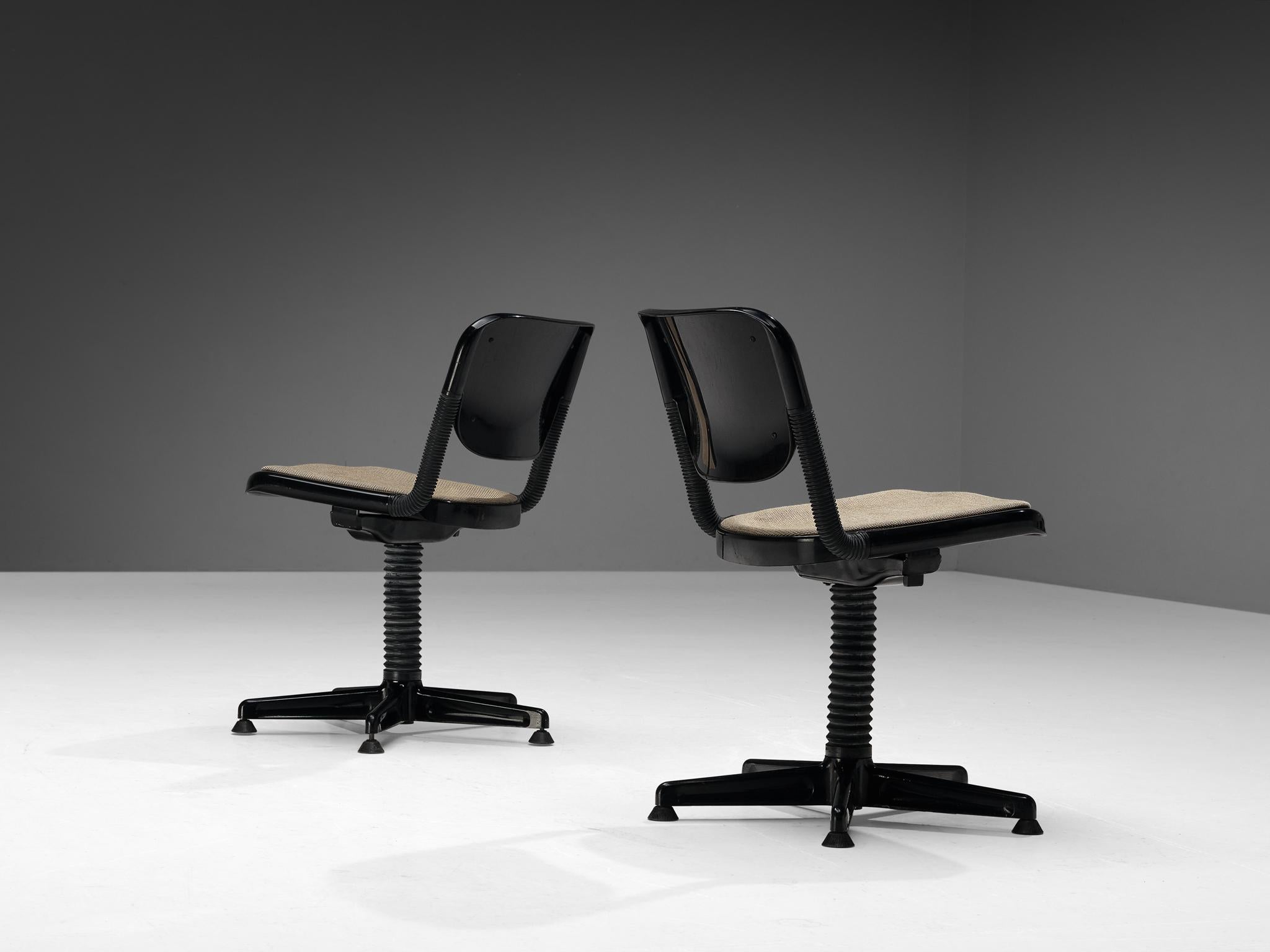 Emilio Ambasz & Giancarlo Piretti, desk chairs, plastic, fabric, metal, Italy, 1976

Swivel desk chairs that are adjustable in height. The chairs are designed by the Italian designers Emilio Ambasz and Giancarlo Piretti. They are light in their