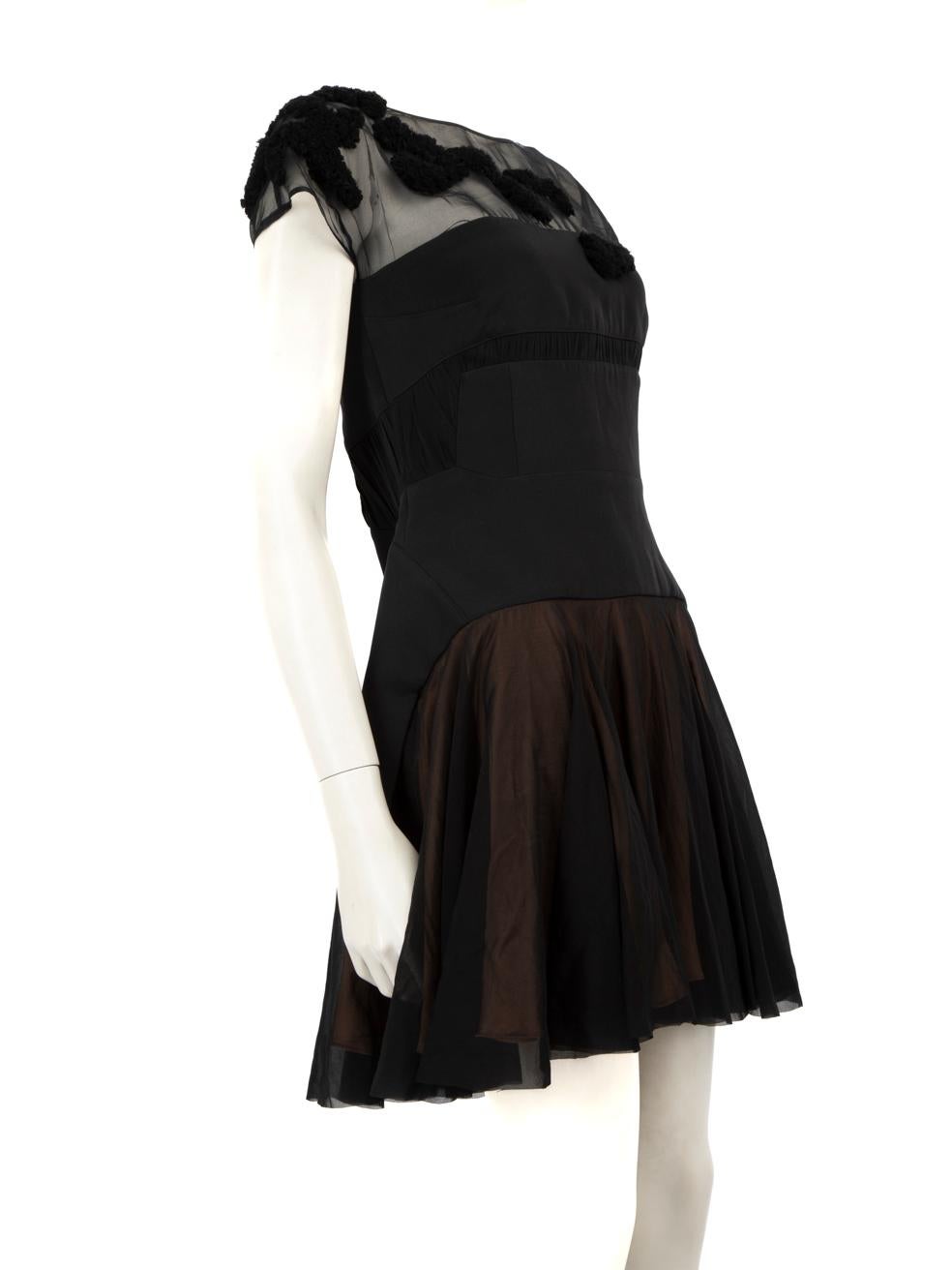 CONDITION is Good. Minor wear to dress is evident. Discolouration marks on the shoulders and near the armholes on this used Emilio de la Morena designer resale item.
 
 Details
 
 
 Black
 
 Silk
 
 Dress
 
 Mini
 
 Short sleeves
 
 See- through
 
