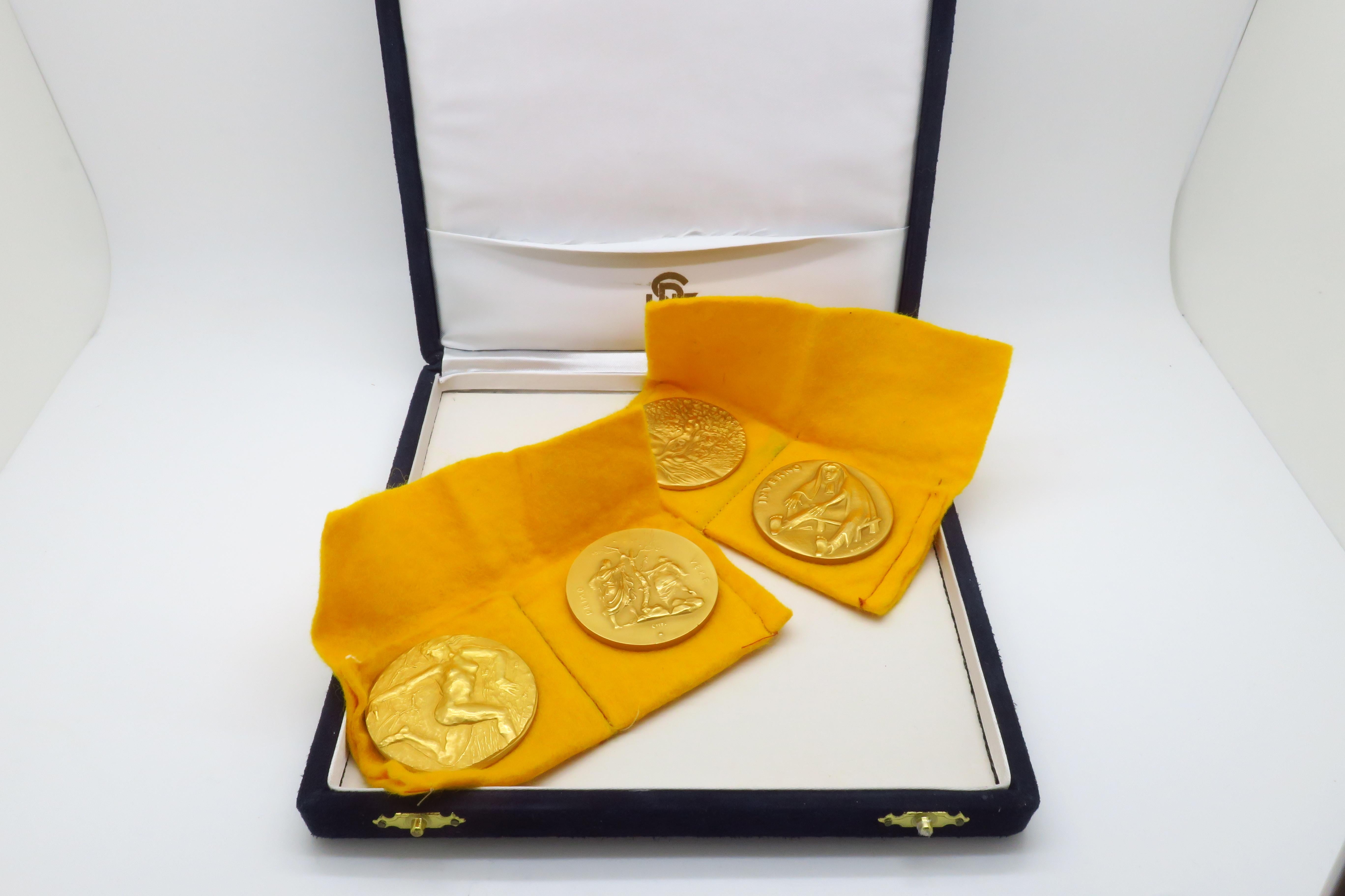 Set di medaglie in oro massiccio 