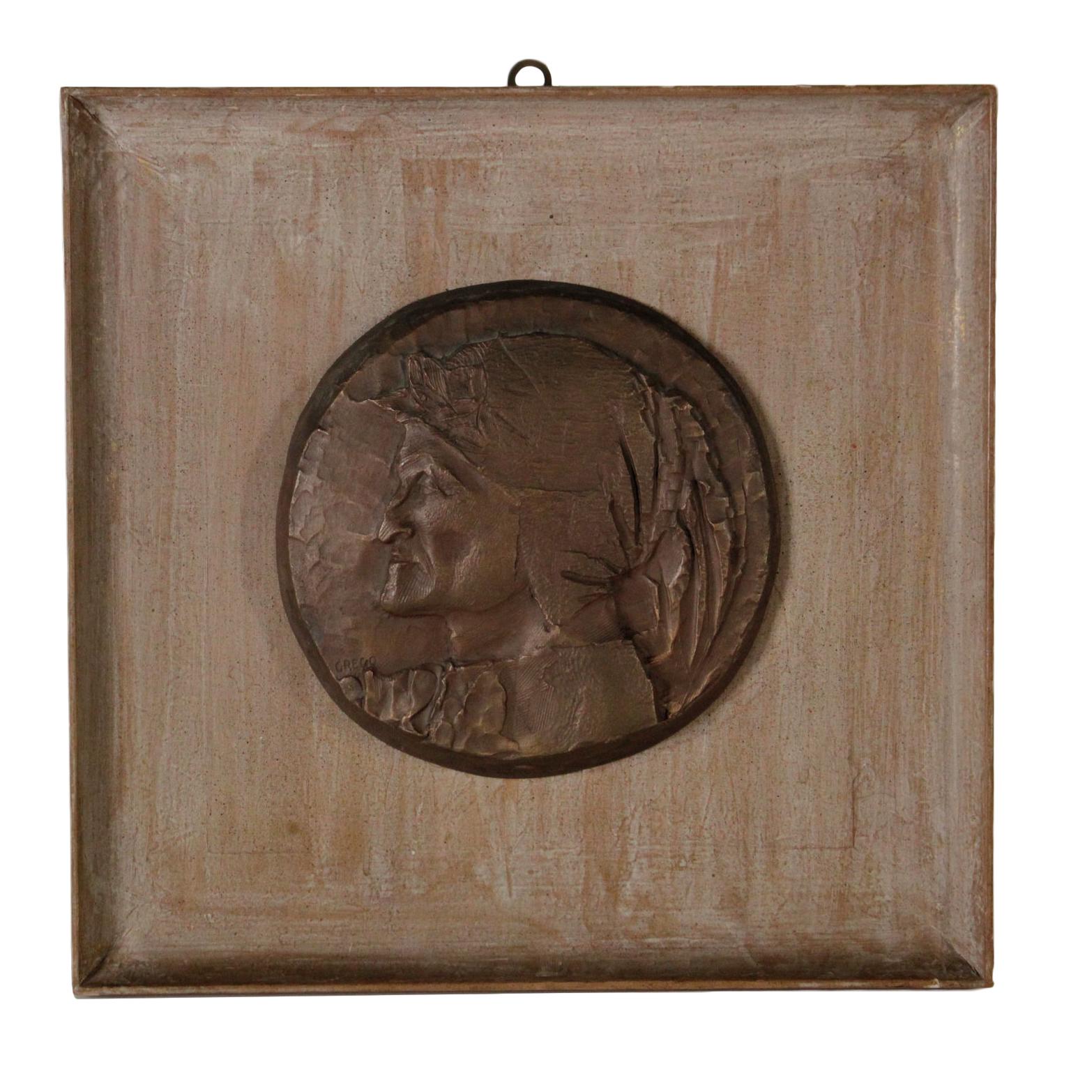 A bronze bas-relief made by Emilio Greco (1913-1995) depicting Dante Alighieri. Signed in the lower left corner. Accompanied by a catalogue article beloging to the "Rassegna di scultura dantesca contemporanea" of Ravenna, 1975 as exempla work, out
