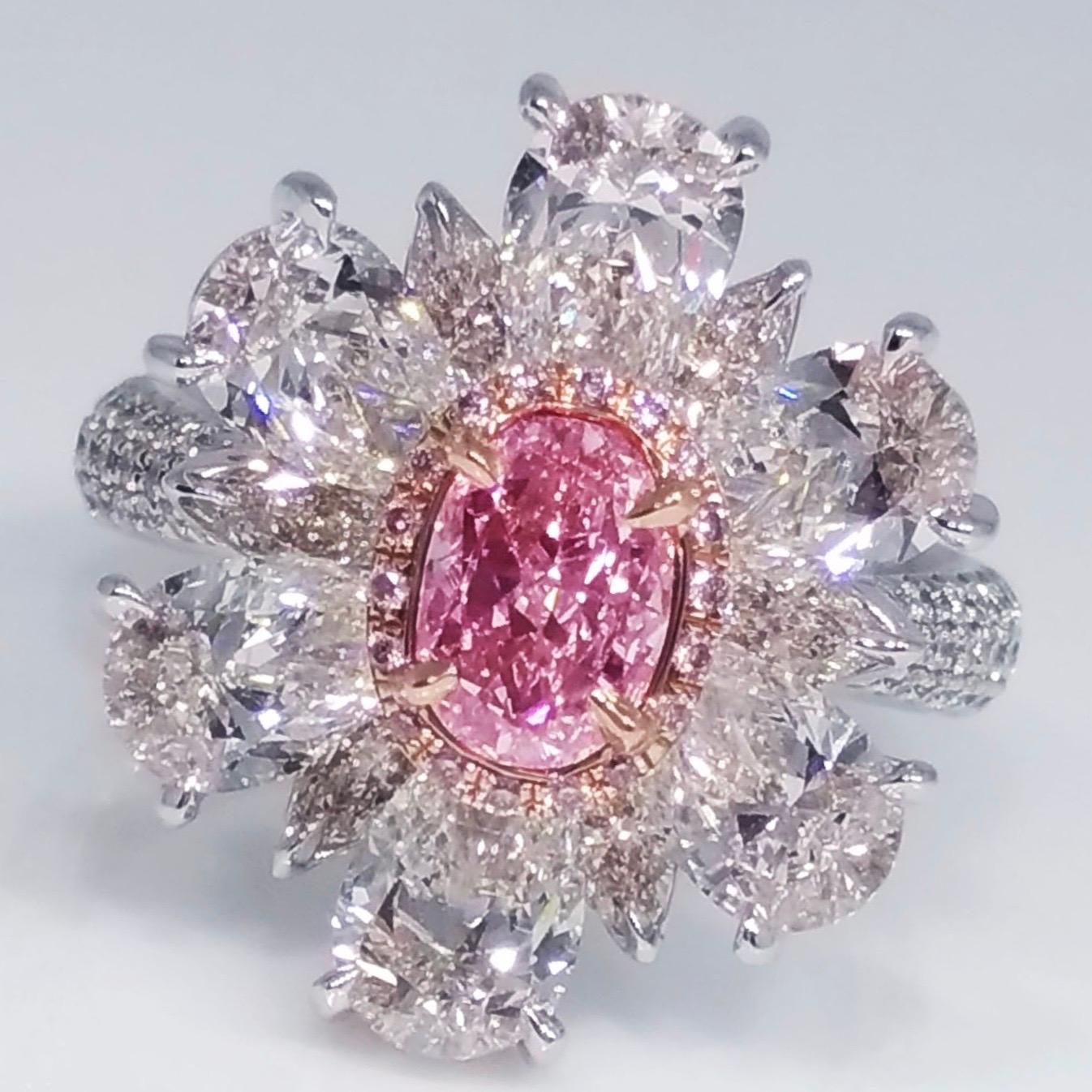 From the Emilio Jewelry Museum Vault, Showcasing a stunning 1.00 carat Gia Certified natural fancy purplish pink diamond center. What makes this diamond even more special is the purplish tone adds a special 