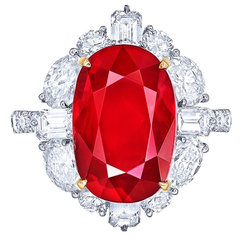 From the Museum Vault at Emilio Jewelry New York,

Main stone: 10.00 carat Pigeon Blood (Vivid  Red) OVAL
Setting: 24 white diamonds totaling about 0.704 carats, 4 white diamonds totaling about 0.52 carats, 4 fancy-cut white diamonds totaling about