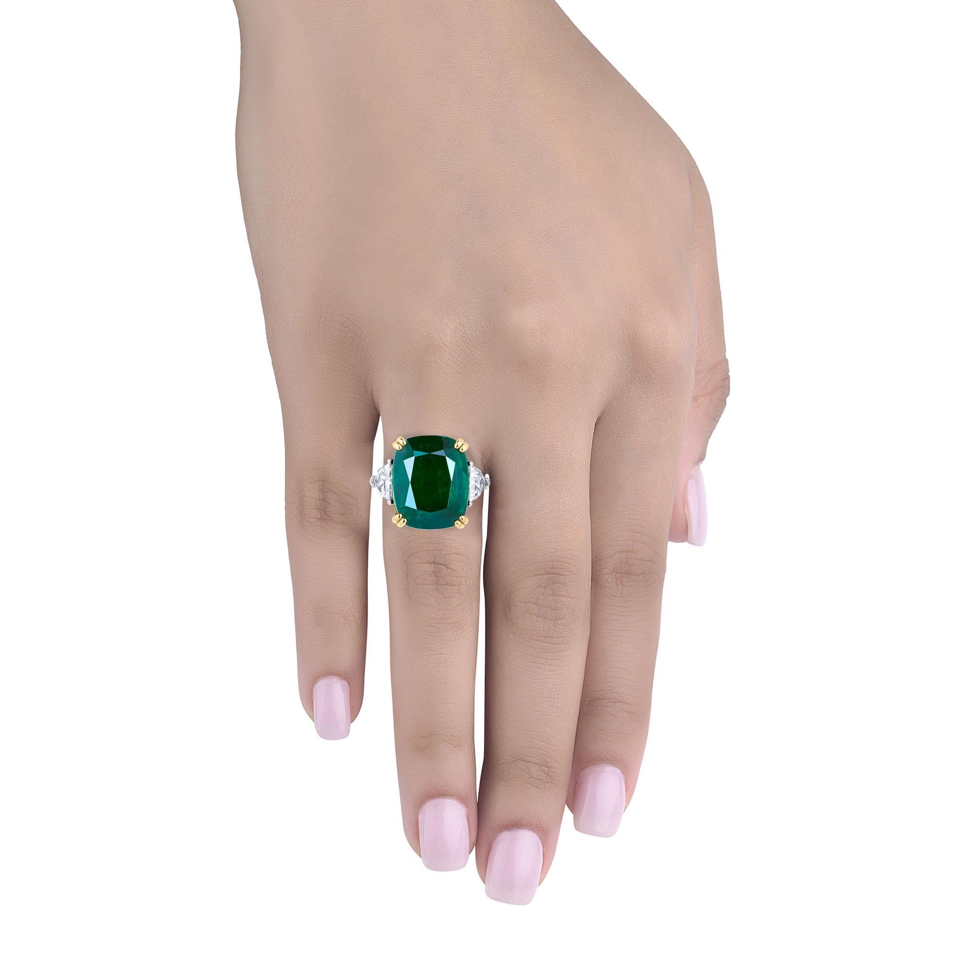Video available upon request! Hand made in the Emilio Jewelry Factory, A gorgeous deep green very clean Cushion Zambian Emerald 11.22 Carats set in the center. The emerald is very clean and completely eye clean. This emerald is very rich in color