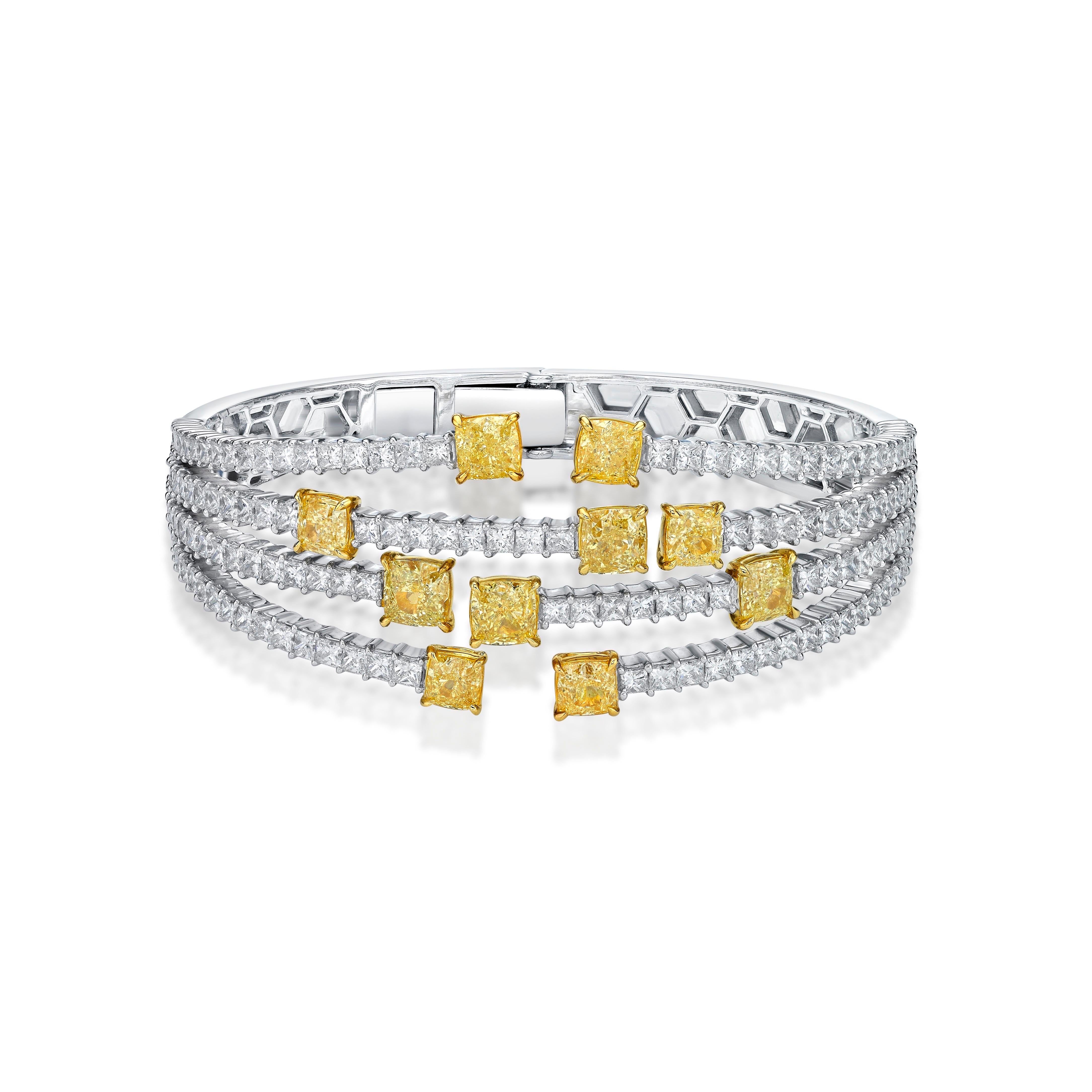 10 cushion diamonds 6.63ct
169 colorless vs natural white diamonds total approx 6.11ct


From The Museum Vault at Emilio Jewelry Located on New York's iconic Fifth Avenue,
Showcasing a very special and rare natural yellow diamonds set in the center,