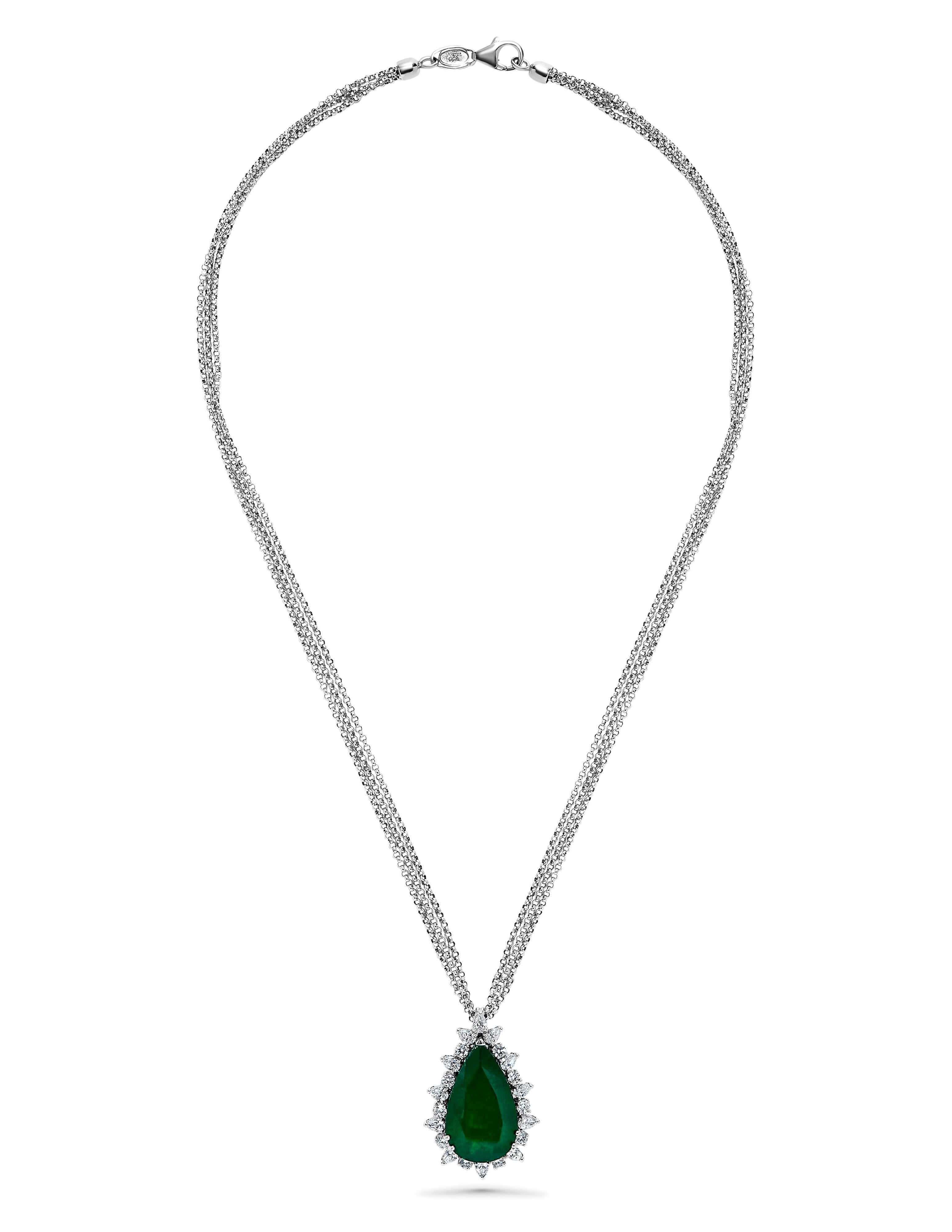 From The Vault At Emilio Jewelry New York,
A magical necklace featuring the best of the best certified vivid green Colombian emerald exceptionally clean and transparent.
1 emerald 12.32cts certified as minor Colombian. 
10 round diamonds .65