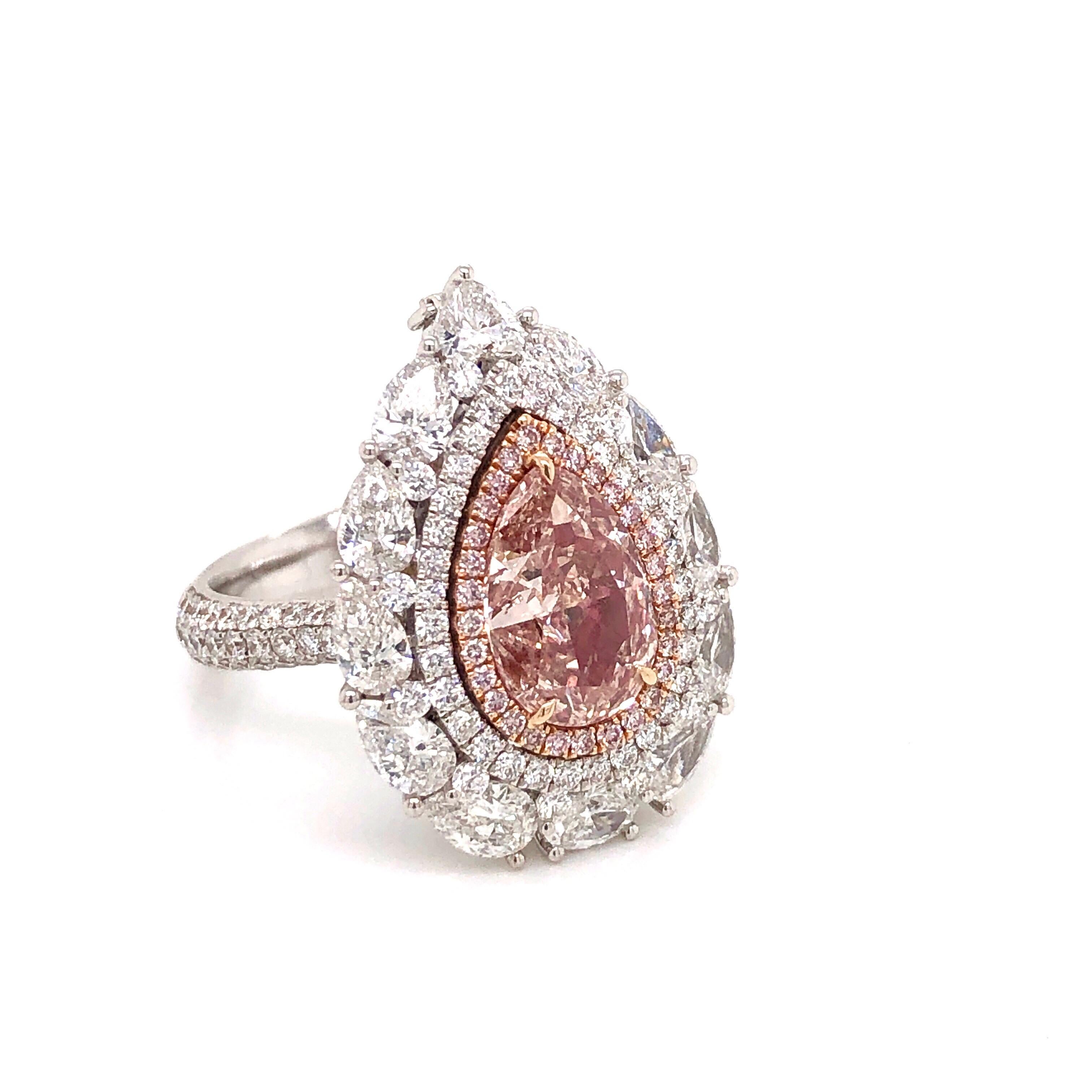 Showcasing a spectacular GIA certified 2.00 Carat Natural fancy brown pink diamond center with excellent saturation throughout. The clarity is si1 and an exceptionally clean diamond. Simply send us a message to request a copy of the GIA report. A