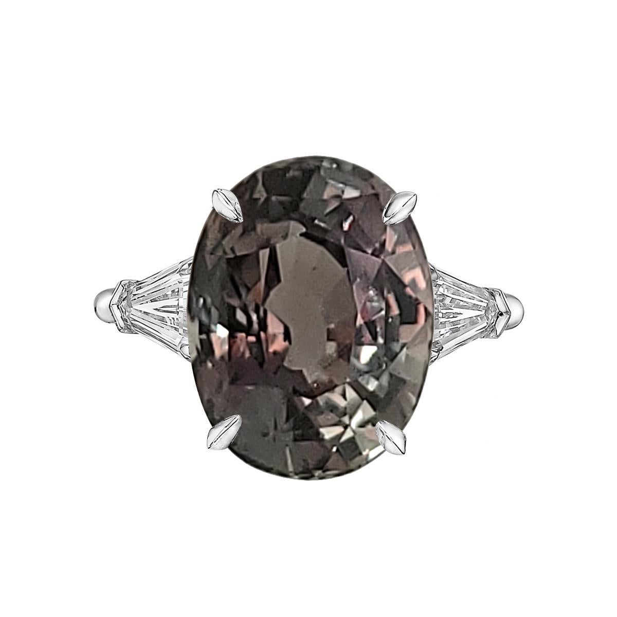 Gia certified natural Bluish green changing to pinkish purple From the Museum vault at Emilio Jewelry, Located On New York’s Iconic Fifth Avenue:
Showcasing a magnificent Alexandrite set in the center certified as Ceylon origin and untreated. Total