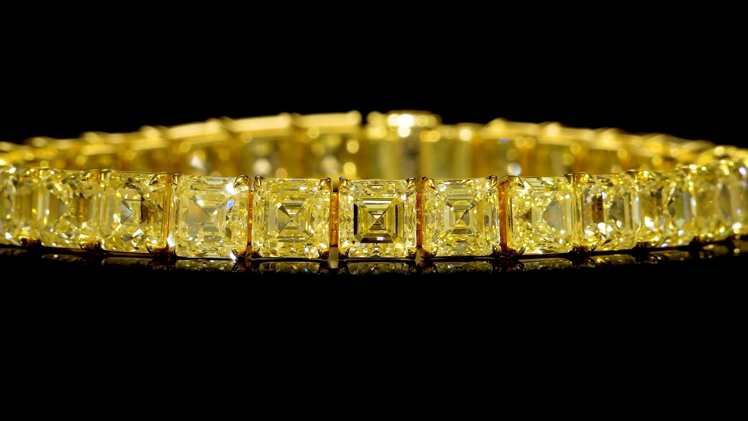 From the Museum Vault at Emilio Jewelry New York,

Super Rare Asscher Cut Canary Diamond bracelet. Each diamond is over 1.00 Carat. Please inquire for details. Asscher cuts are super rare when it comes to yellow diamonds, and this bracelet has 34 of
