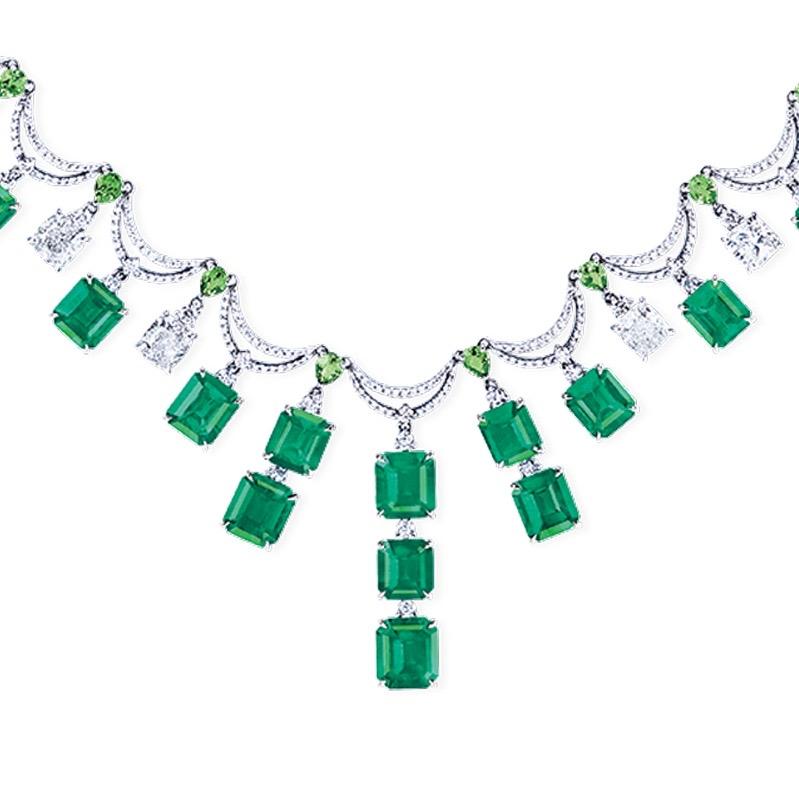 Showcasing Vivid green Muzo color Colombian emeralds certified by Grs, you will be awed by how striking and perfectly matched these rare emeralds are. 
Approximately 28 carats of emeralds (each emerald is certified please inquire)  and 8ct diamonds 