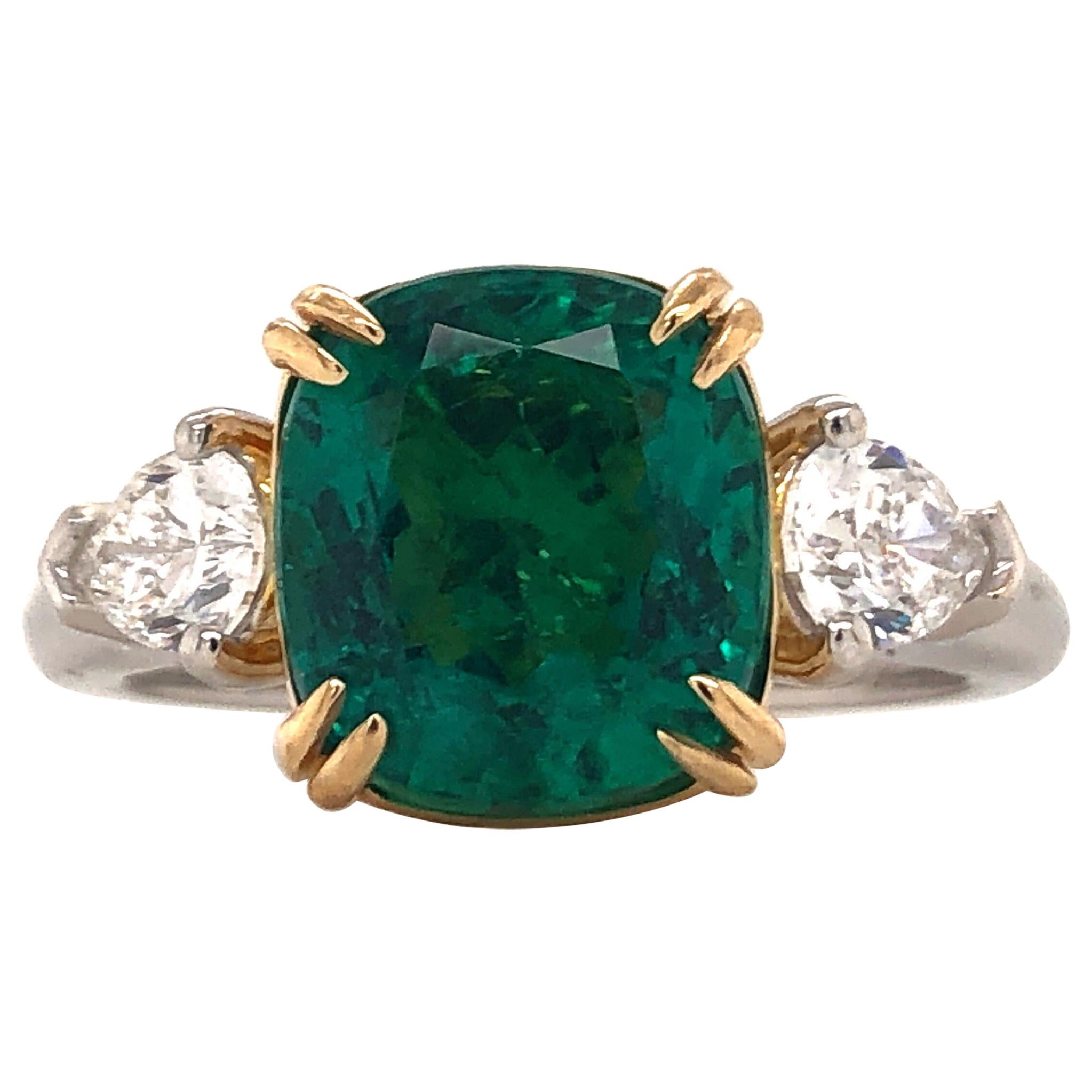 Showcasing a cushion shape 3.57ctct Genuine Emerald certified by C.Dunaigre. 
Origin: Zambian 
Color: Medium green 
Clarity: Based on emerald grading methodology the clarity of the emerald is Internally flawless-vvs1 with no imperfections visible to