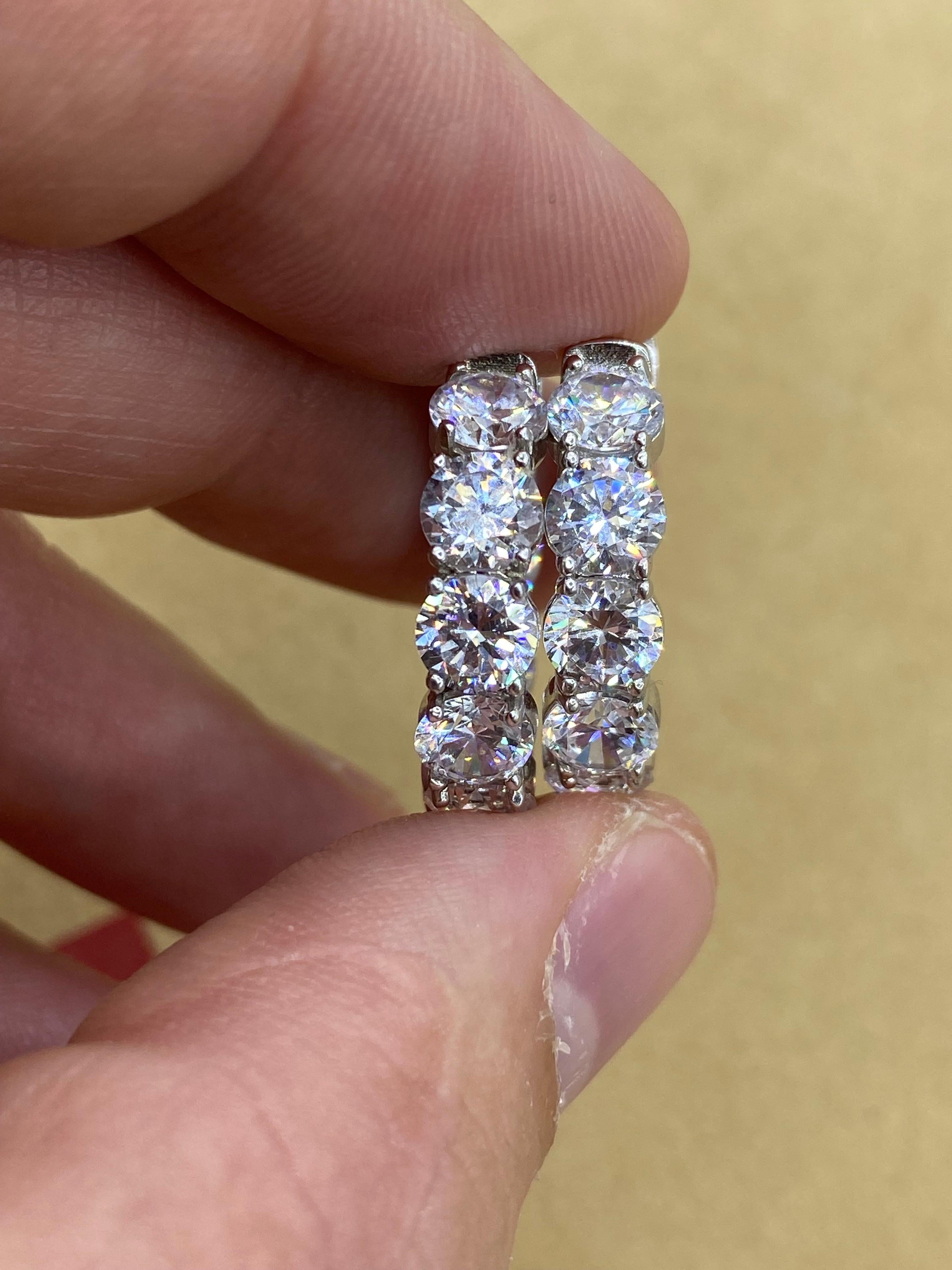 From the vault at Emilio Jewelry New York,

All manufactured by Emilio Jewelry New York, Featuring the largest inventory of inside out diamond hoops with over 300 different stone sizes, and diameters available so please inquire for anything in
