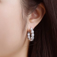 Emilio Jewelry .50 Carat Each Diamond Oval Hoop Earrings
