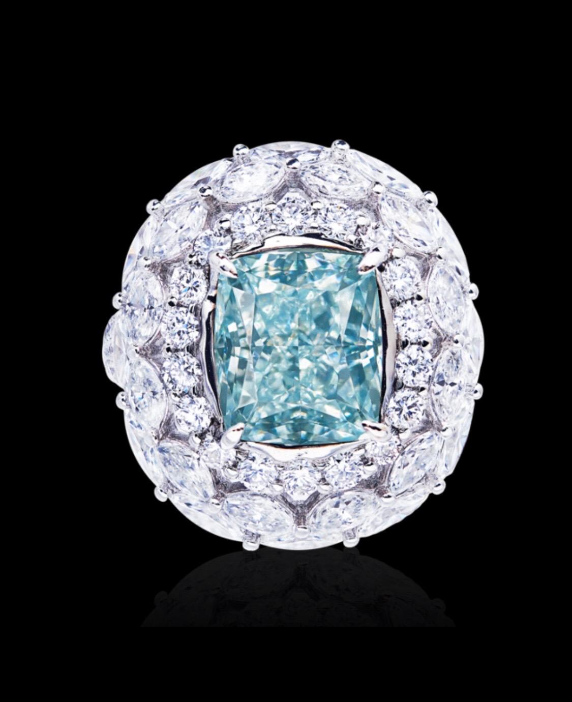 Showcasing a very special certified 5 carat clean natural fancy blue diamond ring certified by GIA. Hand made in the Emilio Jewelry Atelier, whom specializes in rare collectible pieces in the Natural ultra rare fancy colored Diamond sector.
Please