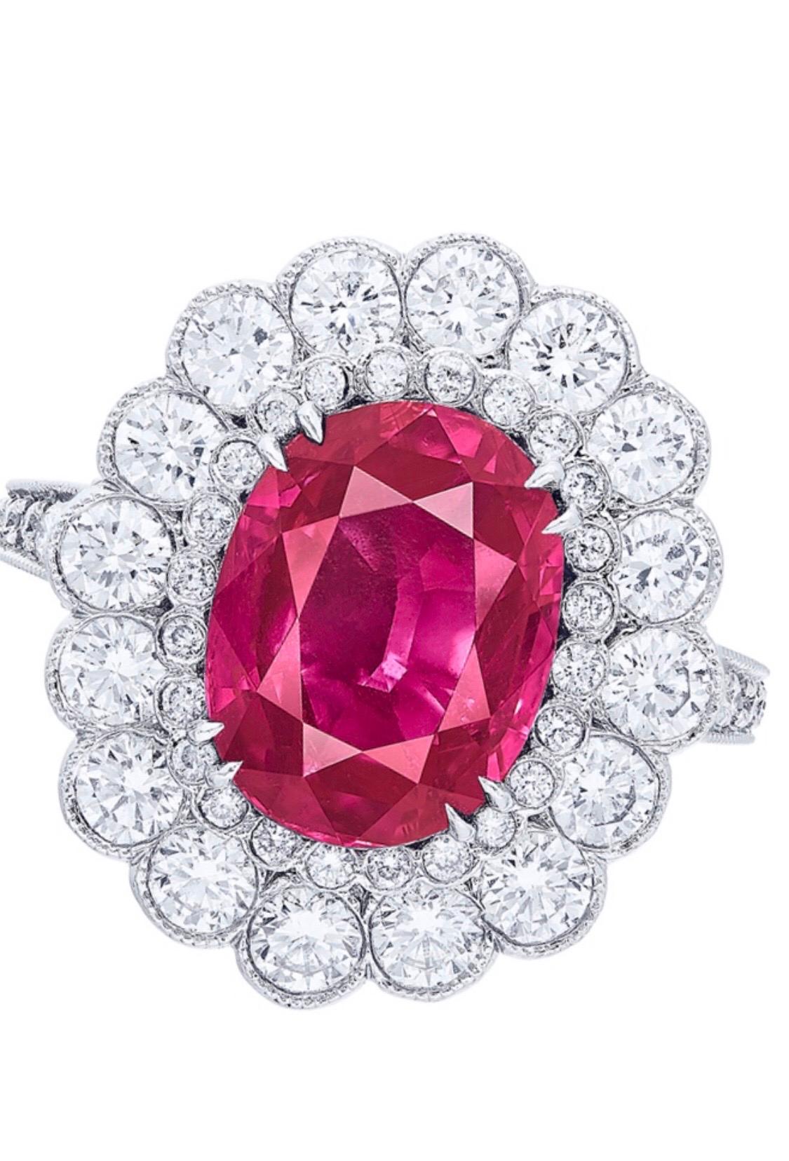 Showcasing a Grs Certified 6.00 carat Mozambique untreated Ruby.  The color is vivid red Pigeons blood red which is the most desirable, rarest, best color available in rubies. The approximate total weight of this ring is 8.20 carats.
This piece was