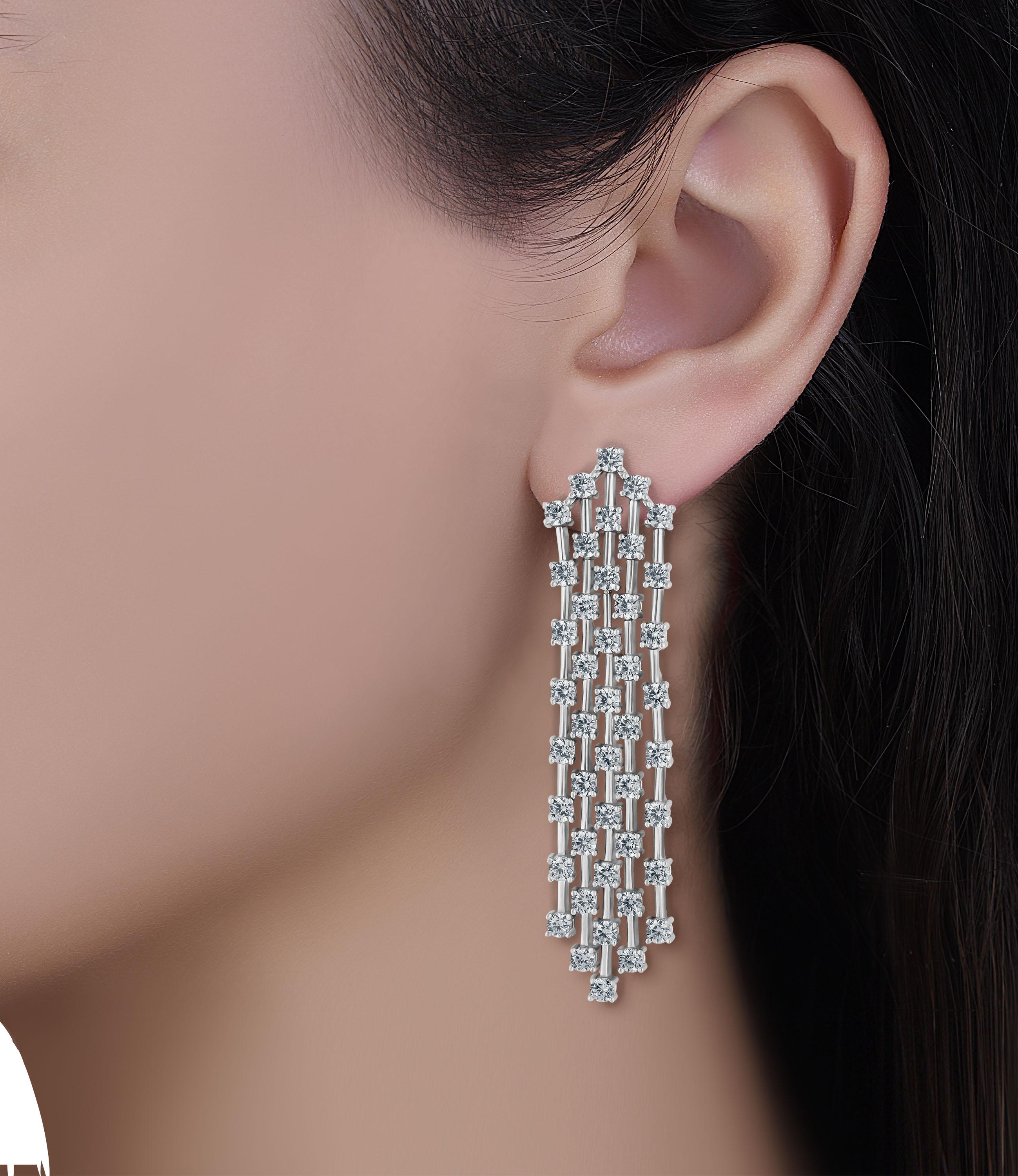 Made in the Emilio Jewelry factory. Earrings Feature 88 diamonds totaling approx 6.20 carats total set in 18k white gold. Available to order in yellow or rose gold. Color F clarity Vs
A complimentary Professional appraisal from AGI included upon