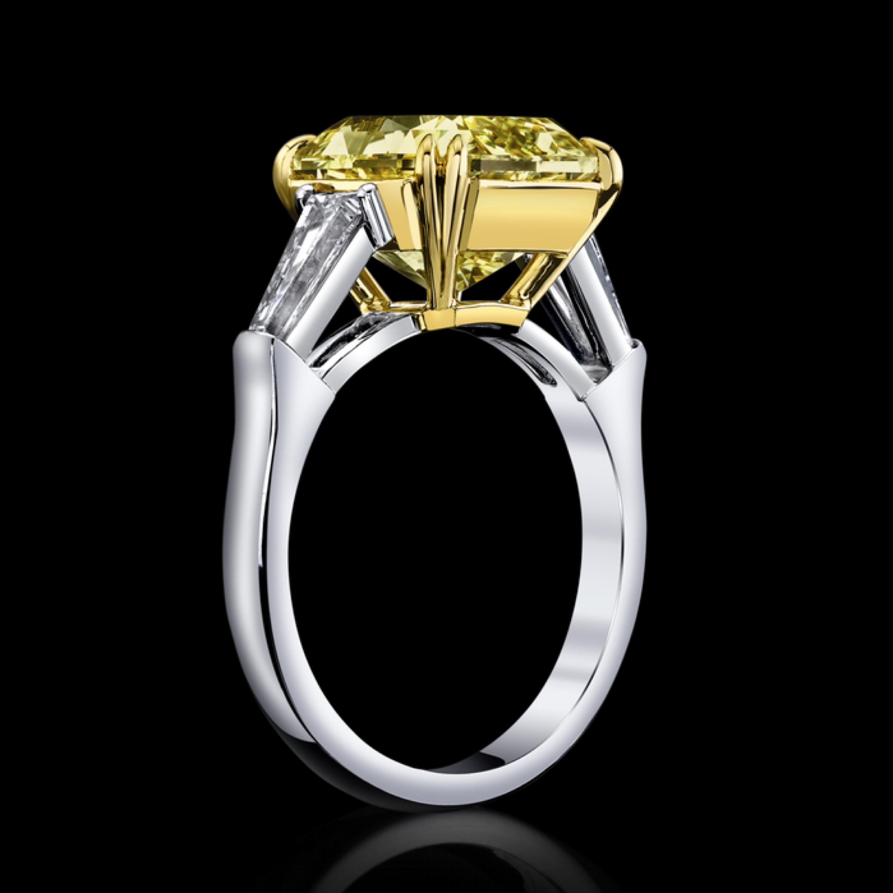From the Emilio Jewelry Vault, Showcasing a stunning 6.50 carat Gia Certified natural fancy pure yellow diamond center. What makes this diamond even more special is the magnificent sparkle and attention it brings to itself. 
Please inquire for more