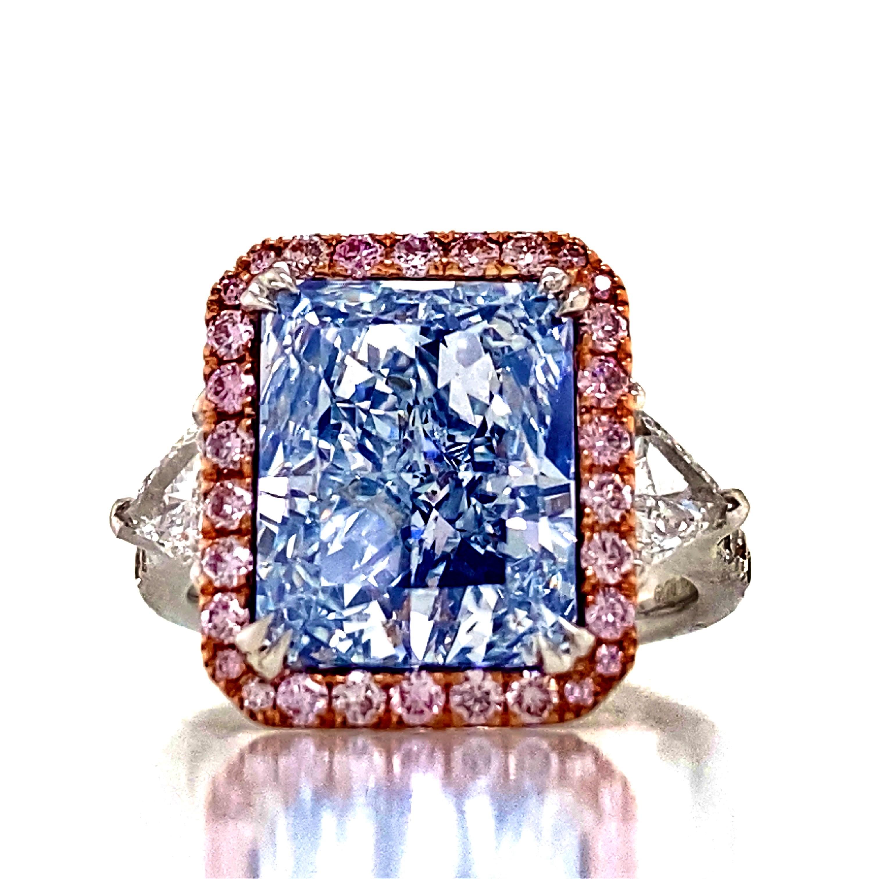 From the Emilio Jewelry Museum Vault, Showcasing a magnificent radiant cut natural Gia certified one of a kind pure light blue diamond with no overtone.  The cutting of the diamond is exceptional, and the shape is very desirable as its a long