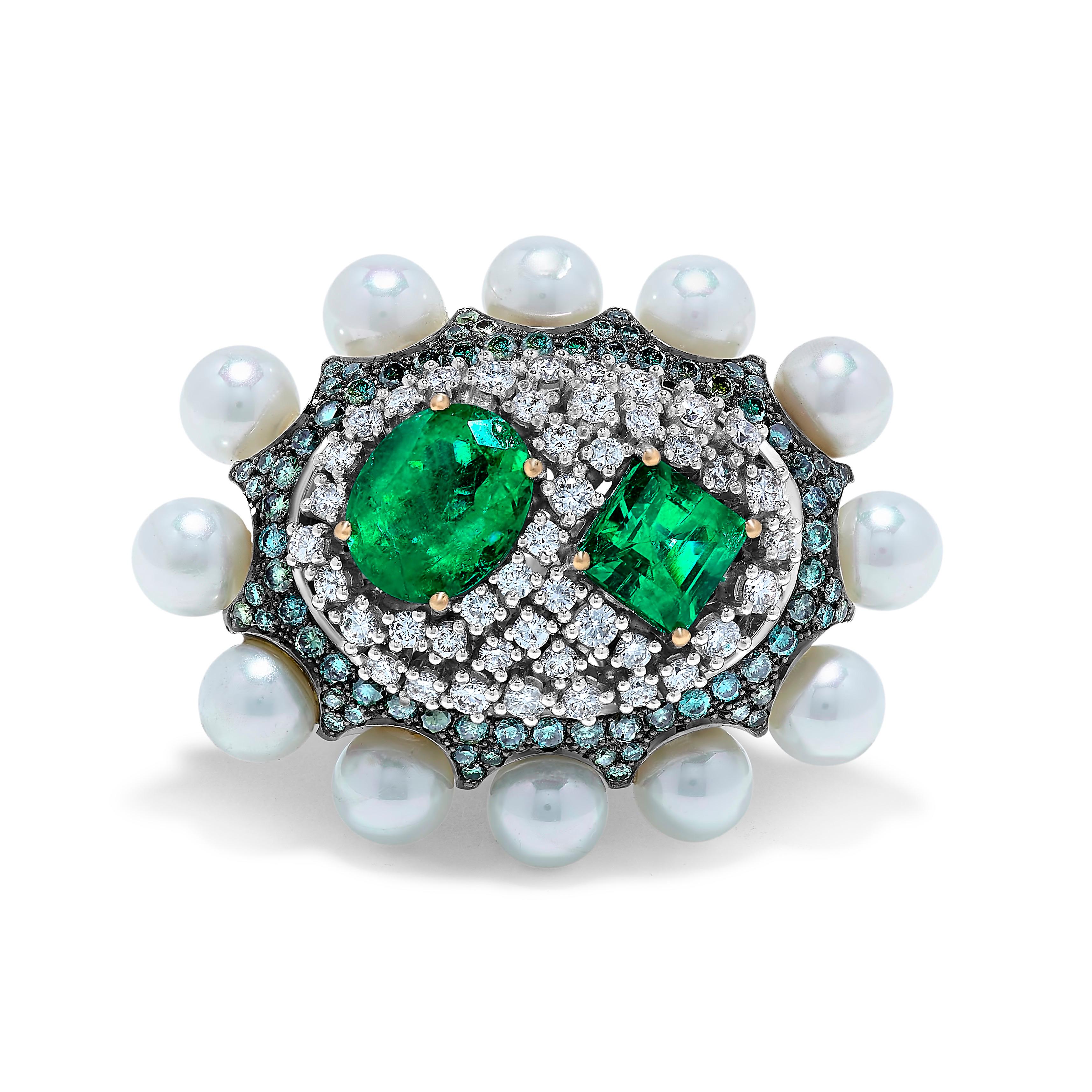 Created by Emilio jewelry New York,
Dare to be different unique style ring featuring the finest Colombian emeralds! 
2 pc Emeralds: appx 4.5 cts
White diamonds 1.5 cts 
Fancy color diamonds 1.5 cts 
