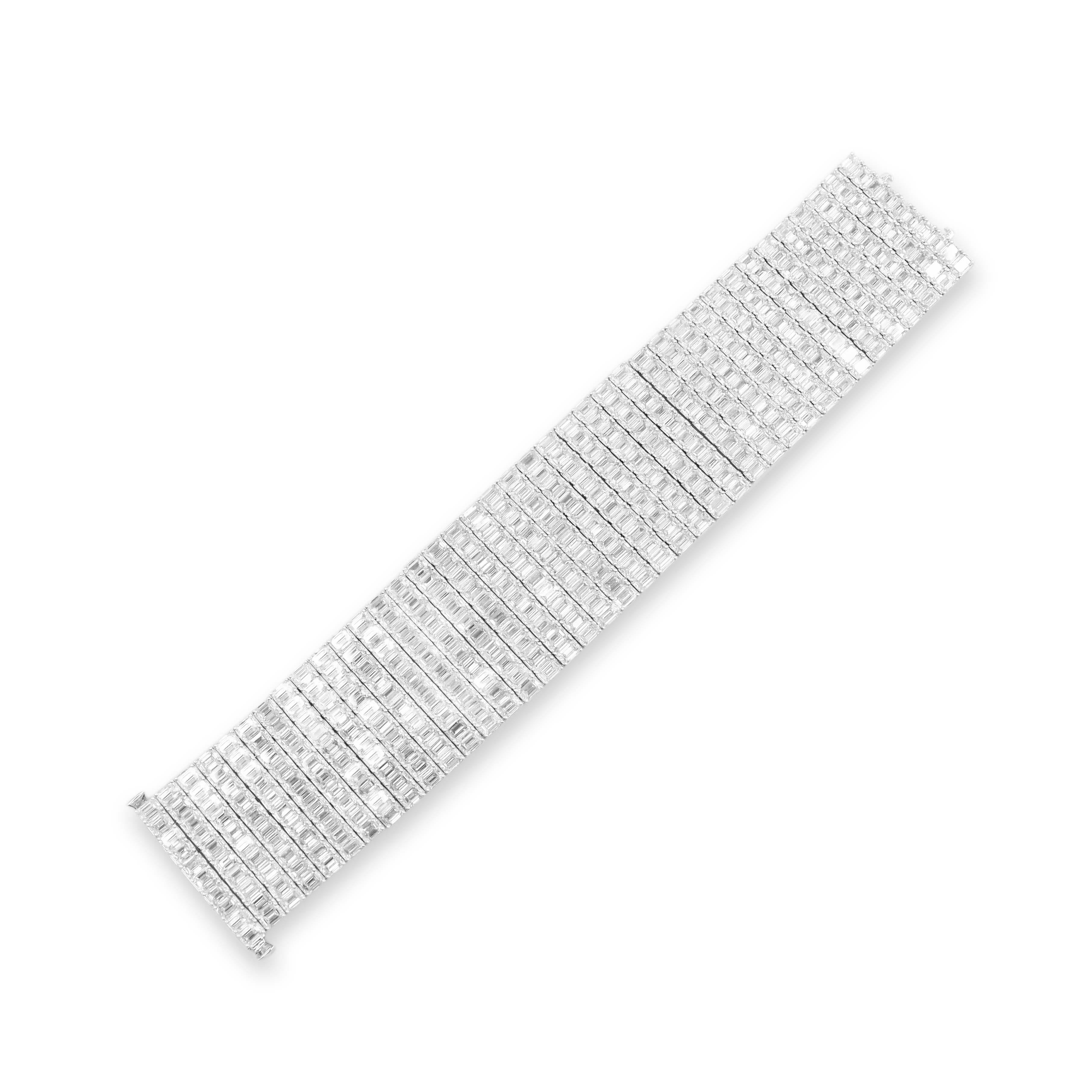 From Emilio Jewelry, a well known and respected wholesaler/dealer located on New York’s iconic Fifth Avenue,
One of a kind Emerald Cut Natural diamond bracelet 10 rows of diamonds! 
Color Average Overall: F-G
Clarity Average Overall: Vs2
Total