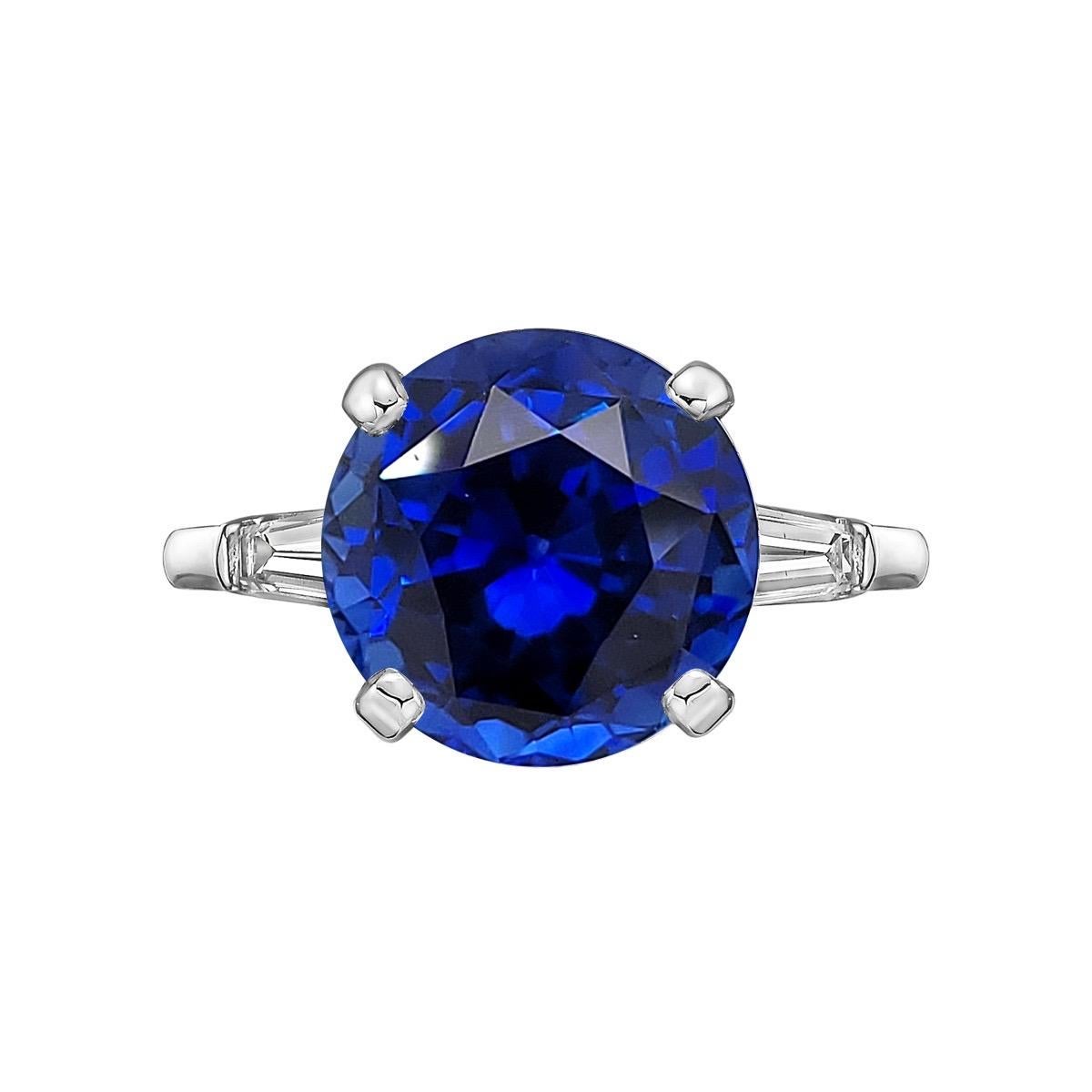From The Vault At Emilio Jewelry New York,
A rare round cut ceylon sapphire with Royal blue color set in this very elegant simple ring. Approximate total weight 8cts please inquire for more information. 
You will love this ring, a must see! Private