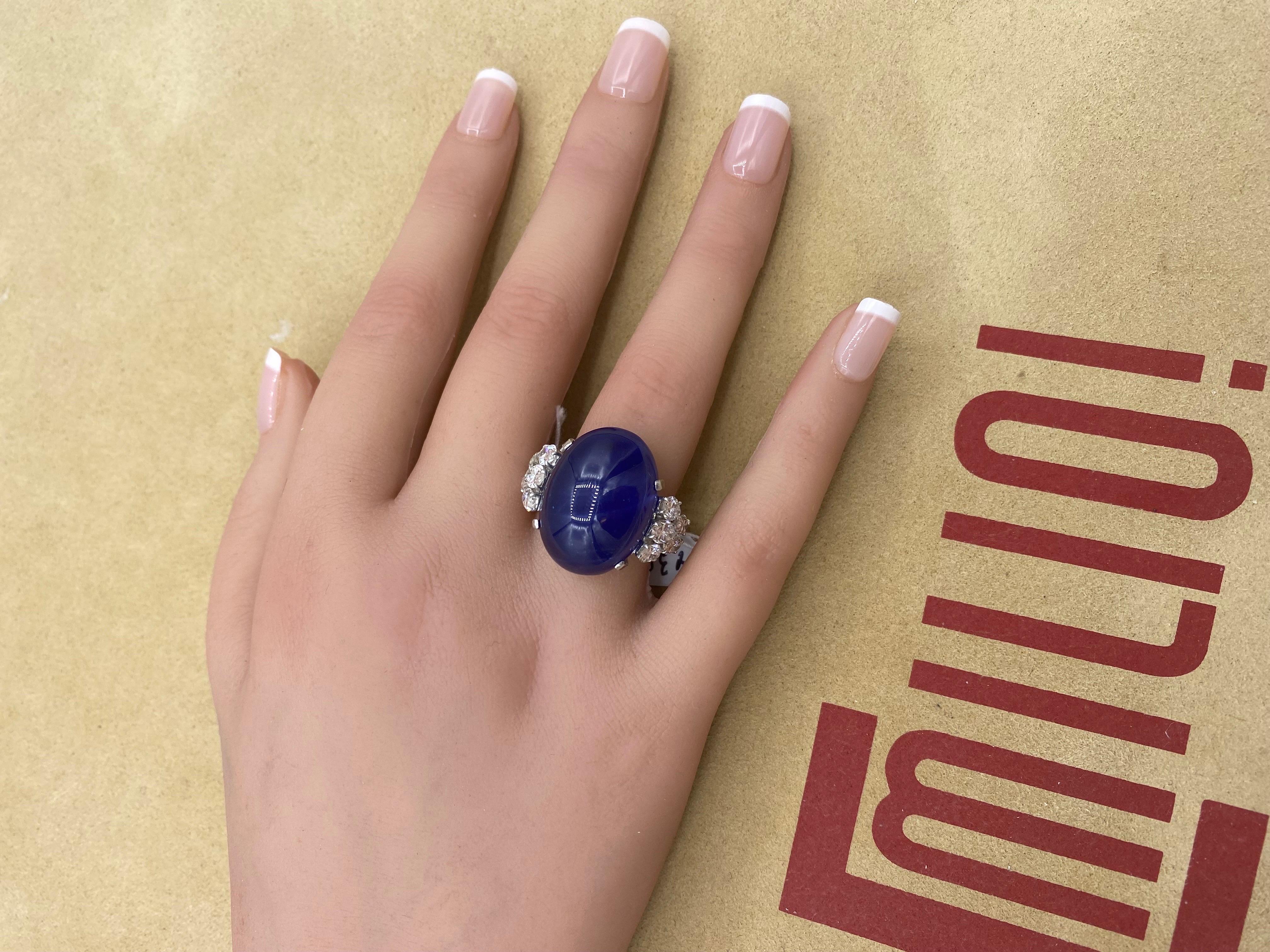 From Emilio Jewelry a well known dealer located on New York's iconic Fifth Avenue,
The focal point of this magnificent ring is the 41.18ct AGL Certified Star Cabochon sapphire of cornflower blue color. The stone is eye clean. 
Diamonds are