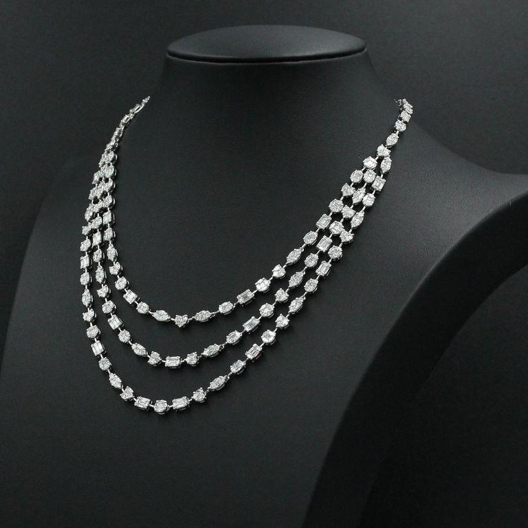 From Emilio Jewelry, a well known and respected wholesaler/dealer located on New York’s iconic Fifth Avenue, 
 20.43 carats of natural diamonds, set into this knockout handmade necklace that sits and flows perfectly! 
Please inquire for more images,