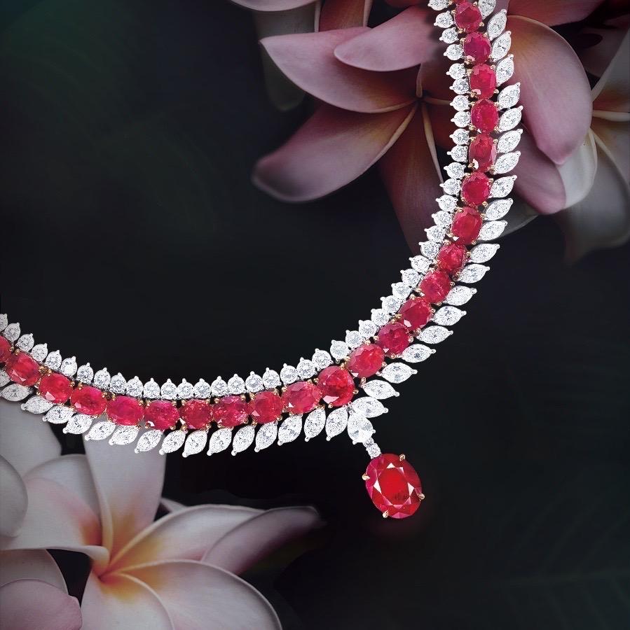 One of the ultimate treasures from the Museum Vault at Emilio Jewelry, a dealer located on New York's iconic fifth avenue,
Featuring an unbelievable array of highly sought after no heat Burmese rubies in Vivid red color as stated on the Grs