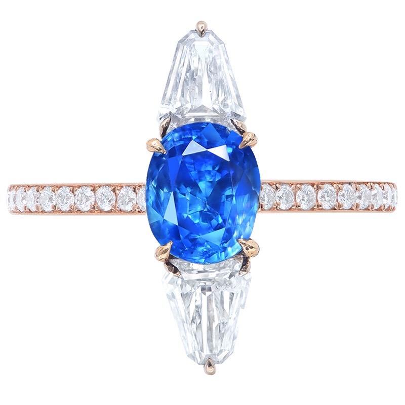 From the Emilio Jewelry Museum Vault in New York,
Main stone:just under 2.00cts
Setting: 2 fancy-cut white diamonds totaling approximately 0.64 carats, 22 white diamonds totaling approximately 0.19 carats, 18K
Certificate: Gubelin Kashmir sapphire