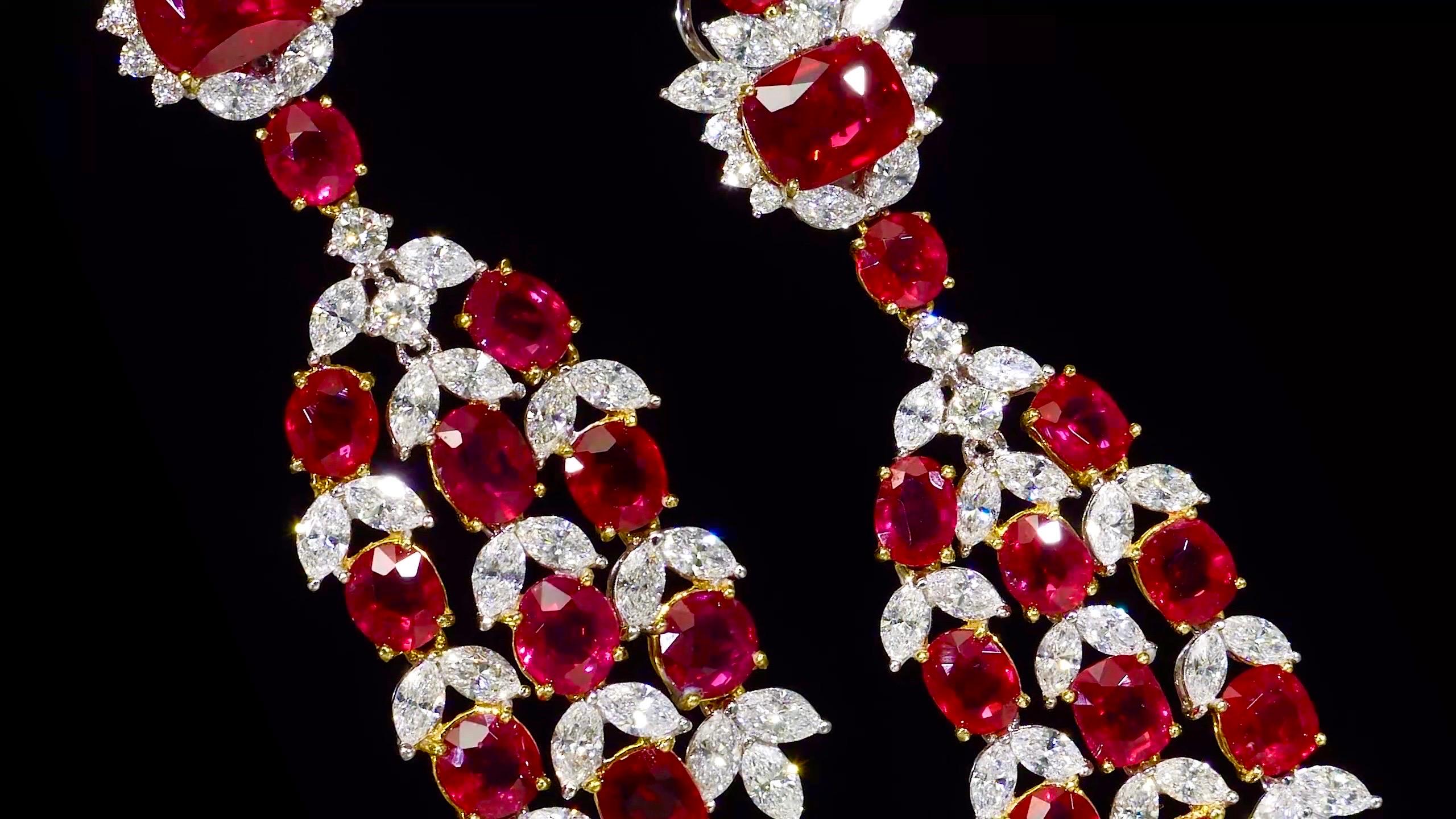 Another hand made masterpiece from the Museum Vault At Emilio Jewelry, located on New York's iconic Fifth Avenue.
Featuring 24 Vivid Red No heat Burma rubies weighing approximately 17.37 Carats. The rubies are very high quality in transparency,