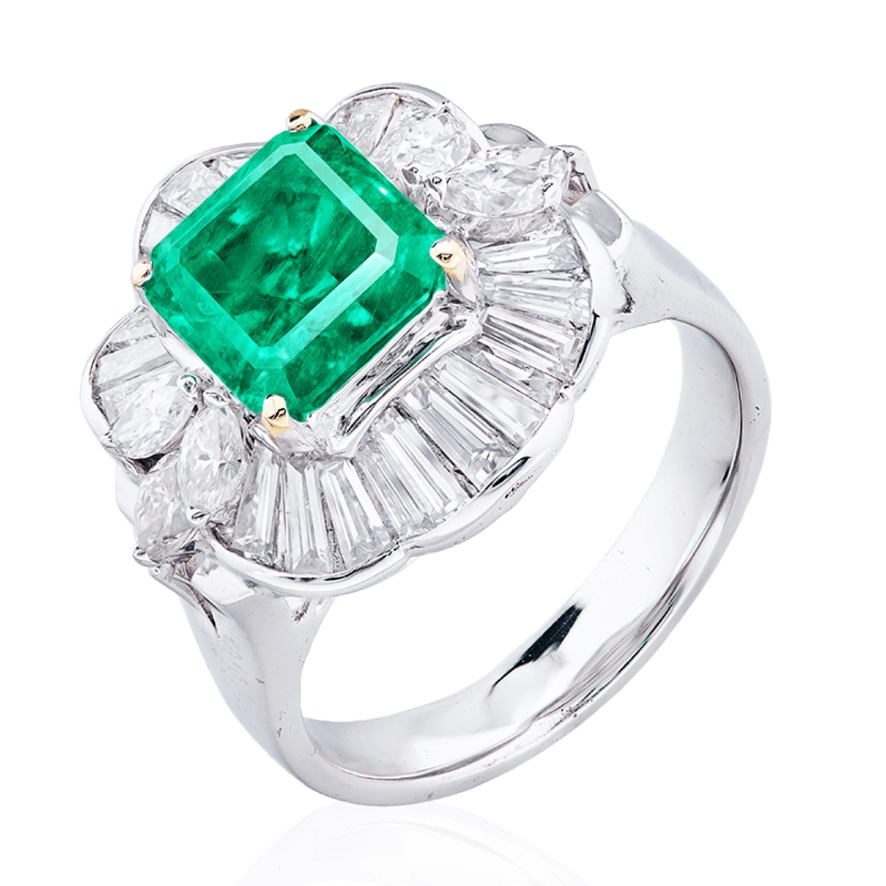 From the Emilio Jewelry Vault in New York City,

Main stone: 2.35 carats Vivid Green Cut cornered rectangle. According to the certificate this emerald is insignificant in oil making it a very rare emerald as most emeralds are minor to moderate