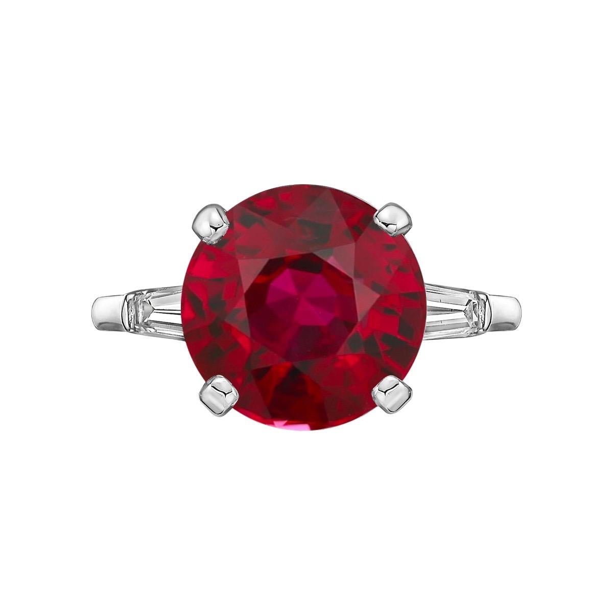 From The Vault At Emilio Jewelry New York,

Main stone: The nicest ruby you will ever see! Its a dream come true. 2.50 carat mozambique pigeons blood ruby of excellent color, clarity, and vibrant. 
Setting:Platinum ring with .50ct of side tapered