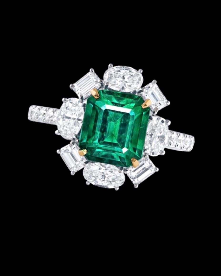 From the Emilio Jewelry Museum Vault, Showcasing a stunning certified 2.69 carat natural no oil untreated emerald set in the center of vivid green saturation. 
We are experts at creating jewels for these very special collectible emeralds. If you